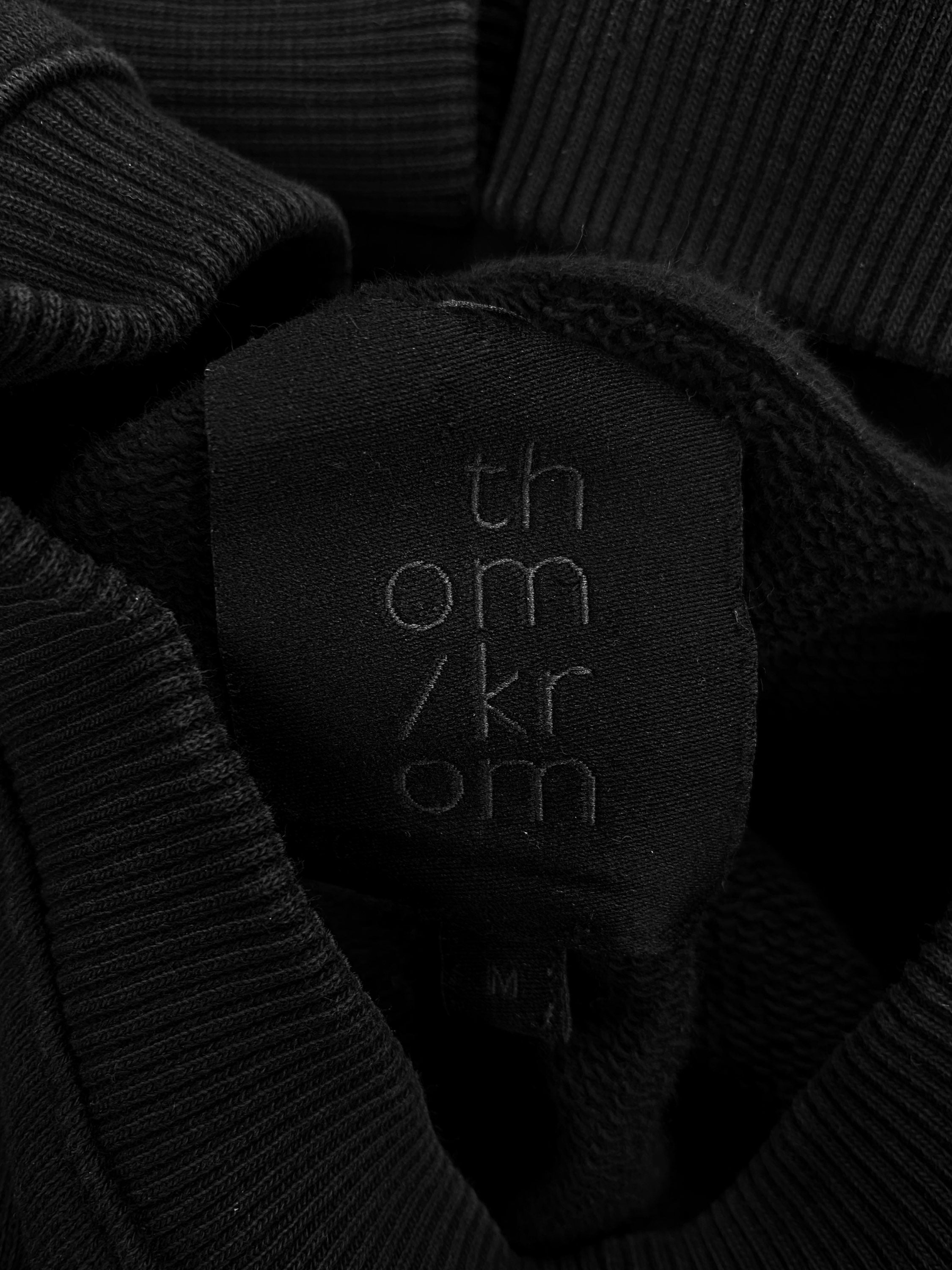 Throm Krom Asymmetric Black Essential Ribbed Crewneck