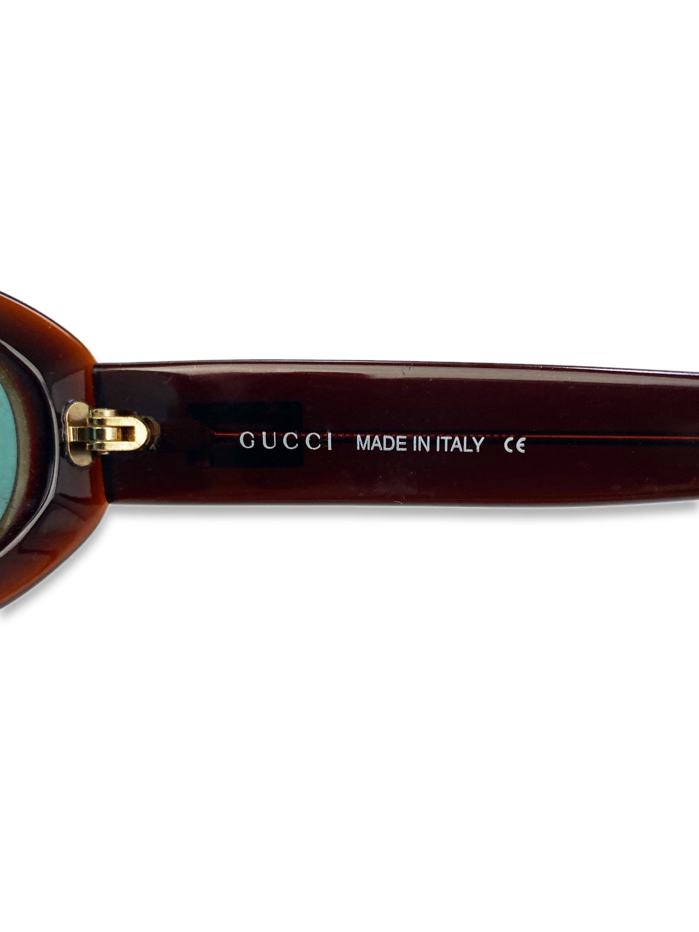 Gucci Blue Tint Oval Frame Metallic Sunglasses