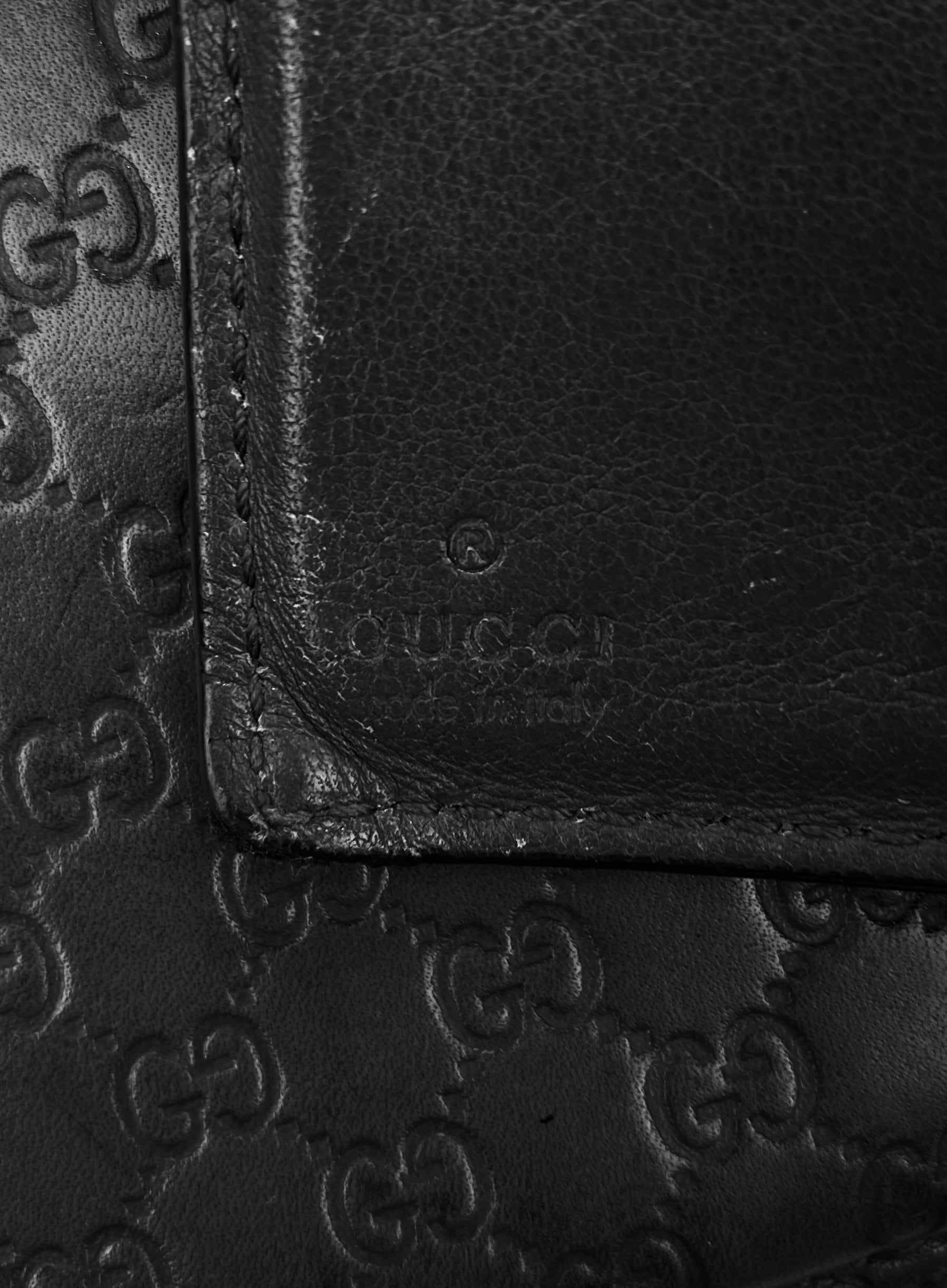 Gucci GG Black Monogram Embossed Bifold Wallet