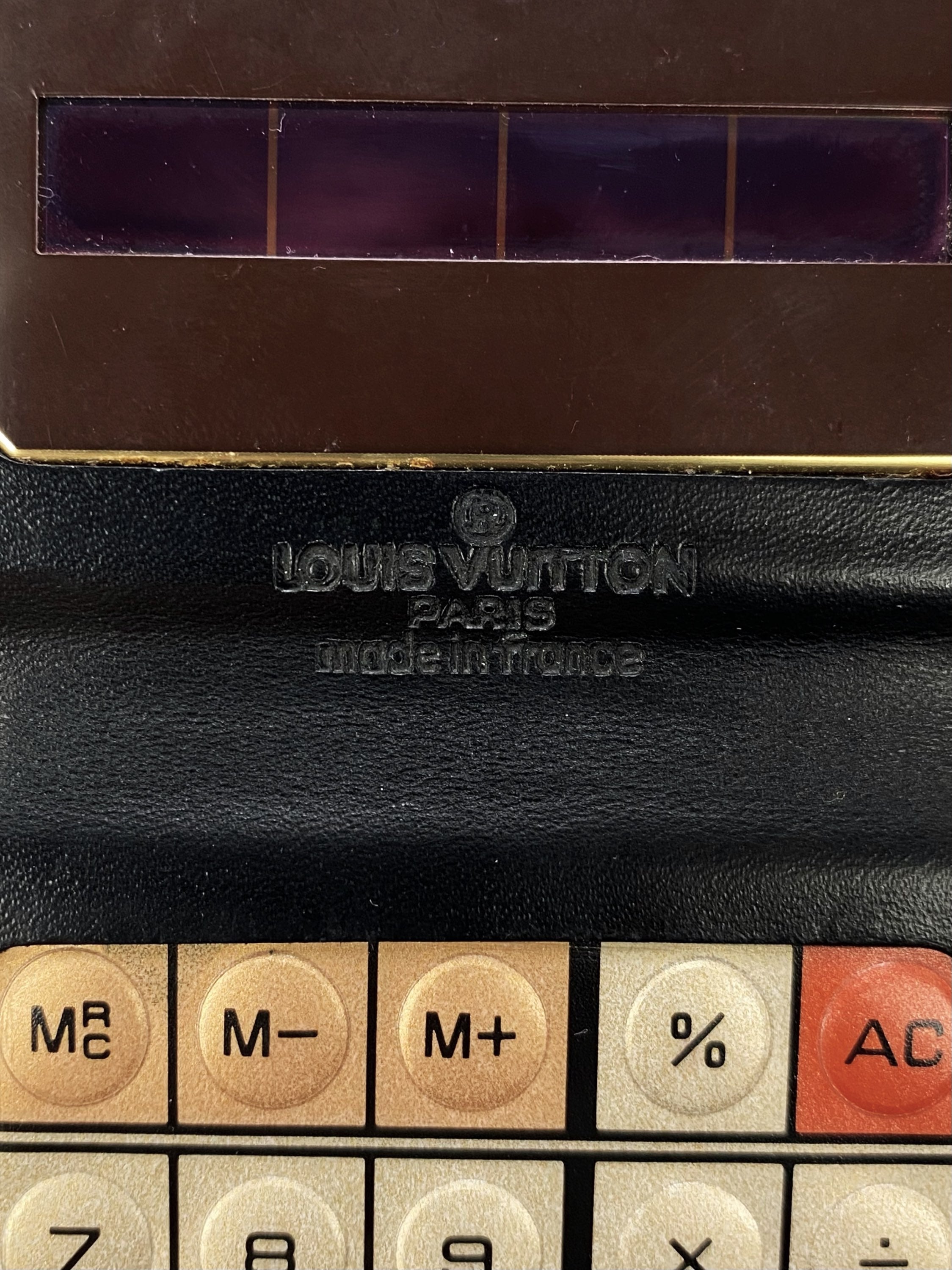 Louis Vuitton Epi Embossed Bifold Calculator
