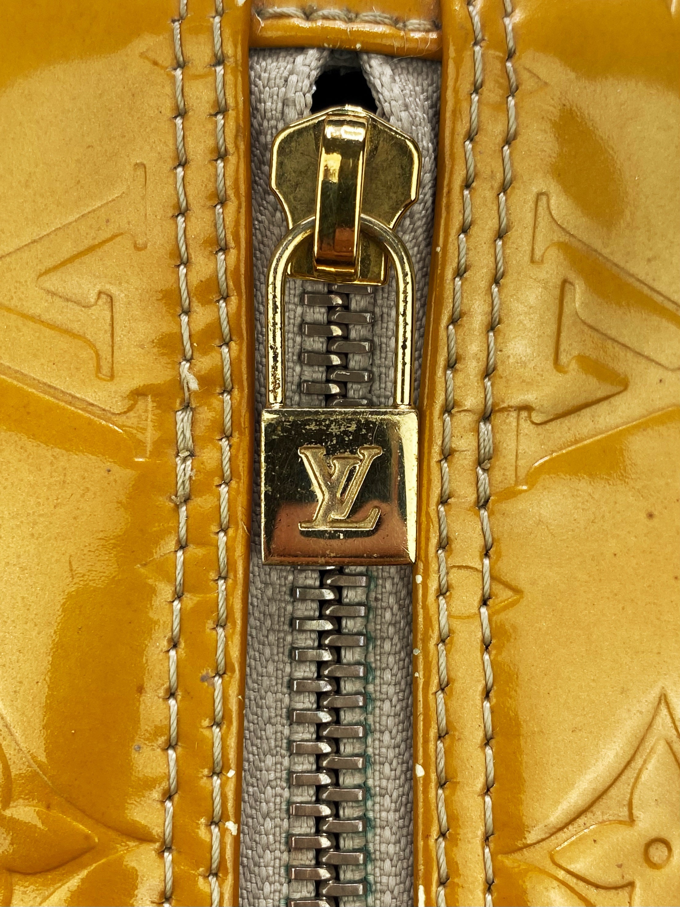 Louis Vuitton Embossed Yellow Leather Strap Roller Bag