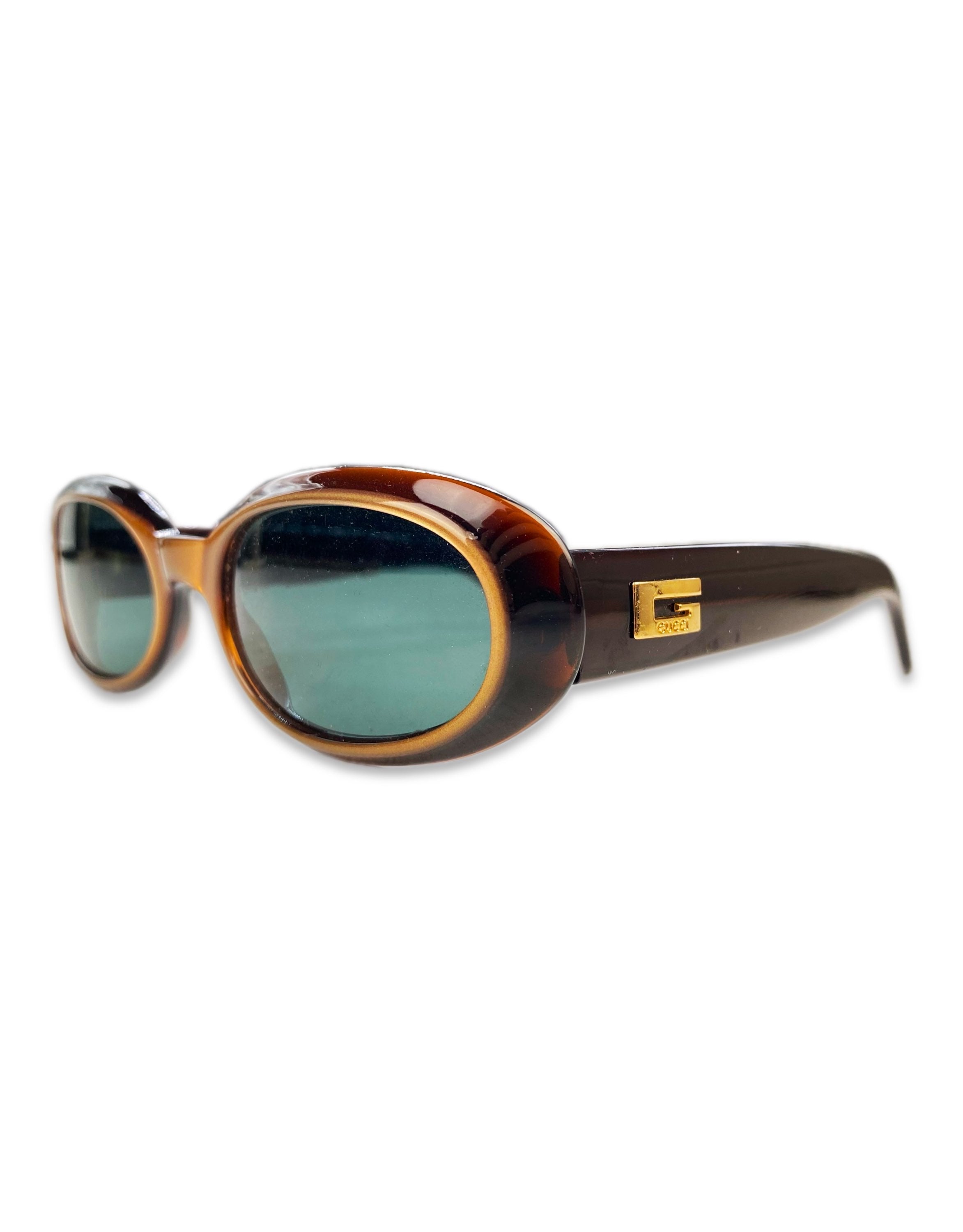 Gucci Blue Tint Oval Frame Metallic Sunglasses
