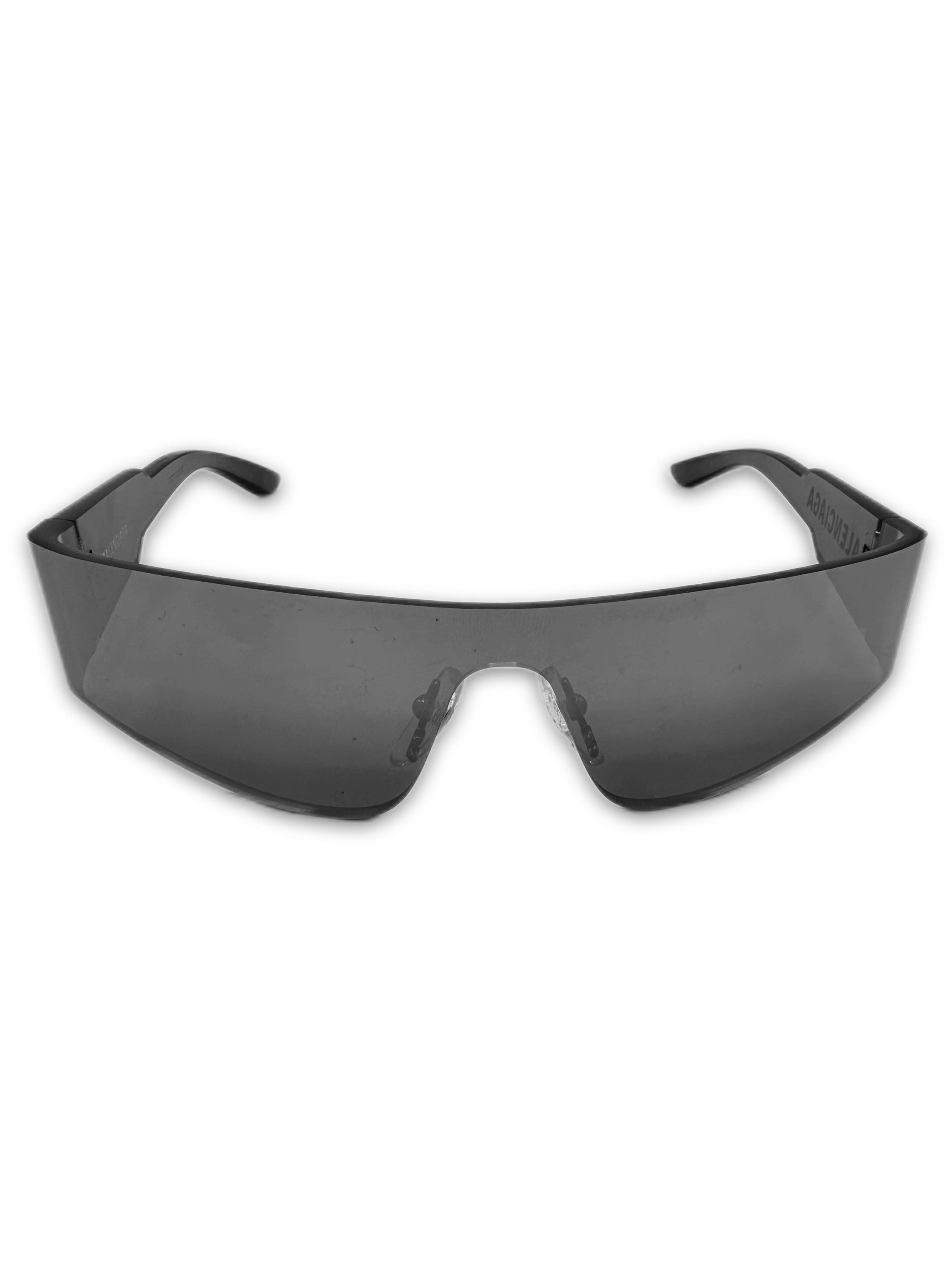 Balenciaga ‘Mono’ Rectangle Shield Dark Tint Rimless Sunglasses