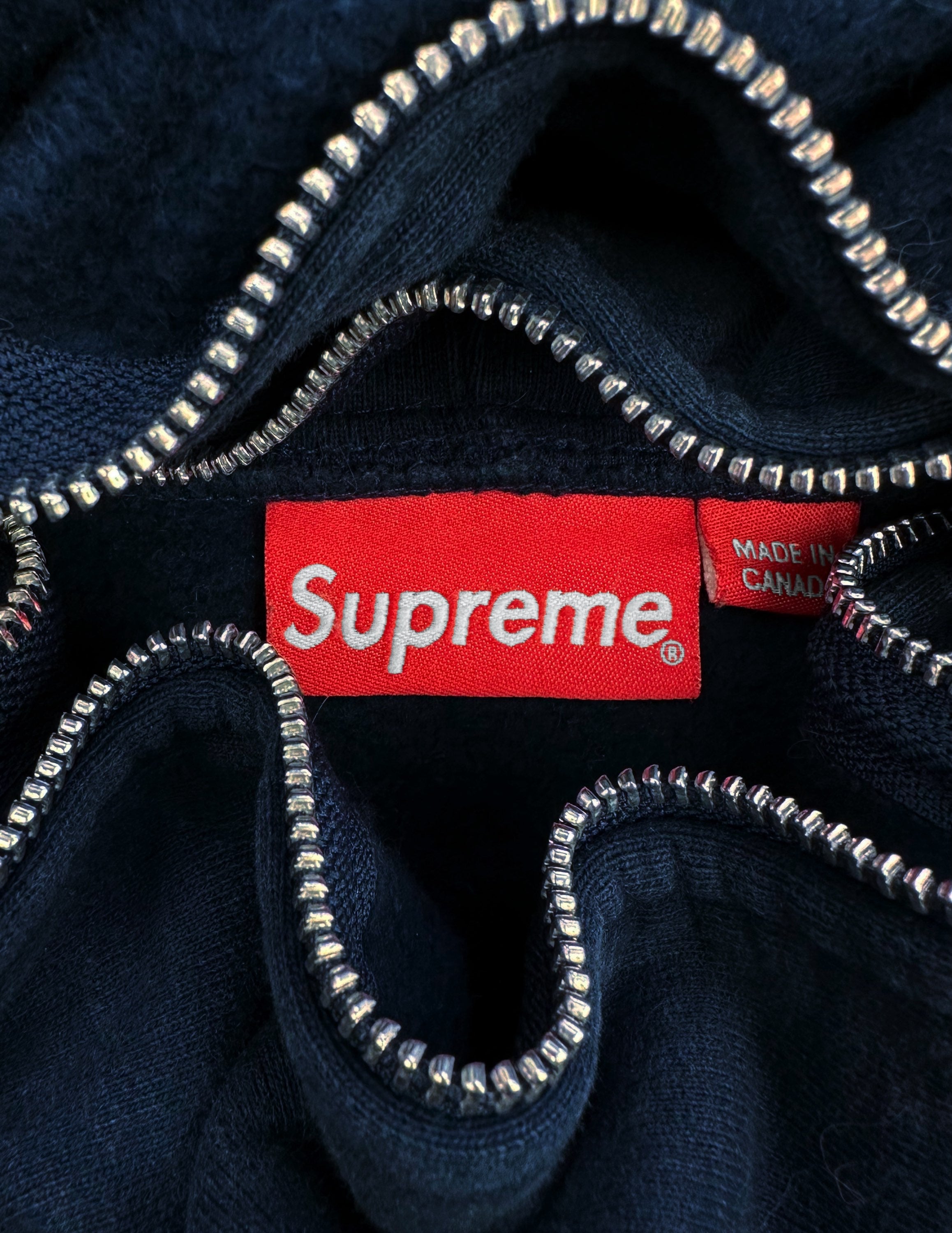 FW13 Supreme x Gonz ‘Piss Face’ Slogan Navy Zip-up Hoodie