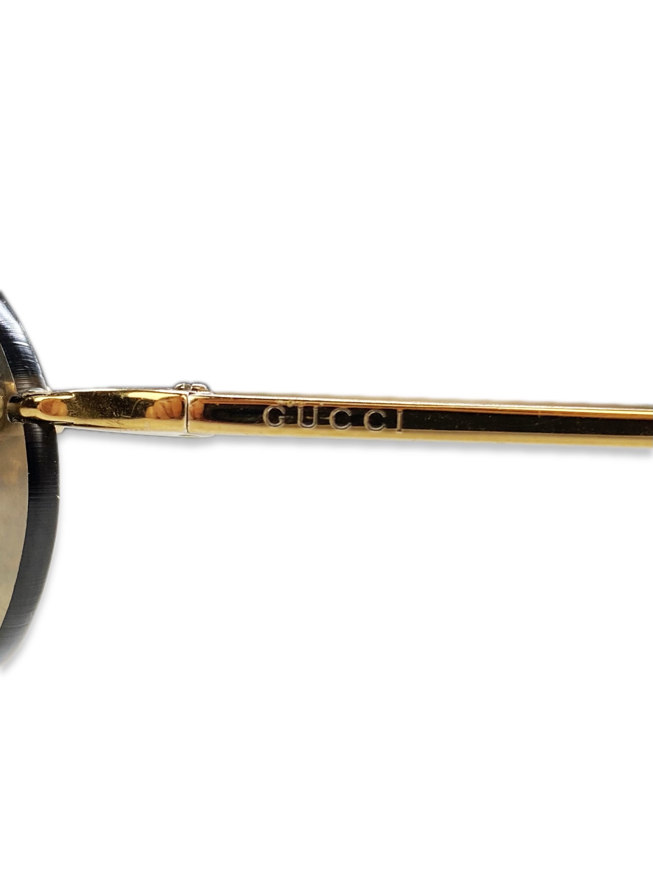 Gucci Warm Tint Gold Metallic Rounded Skinny Frame Sunglasses