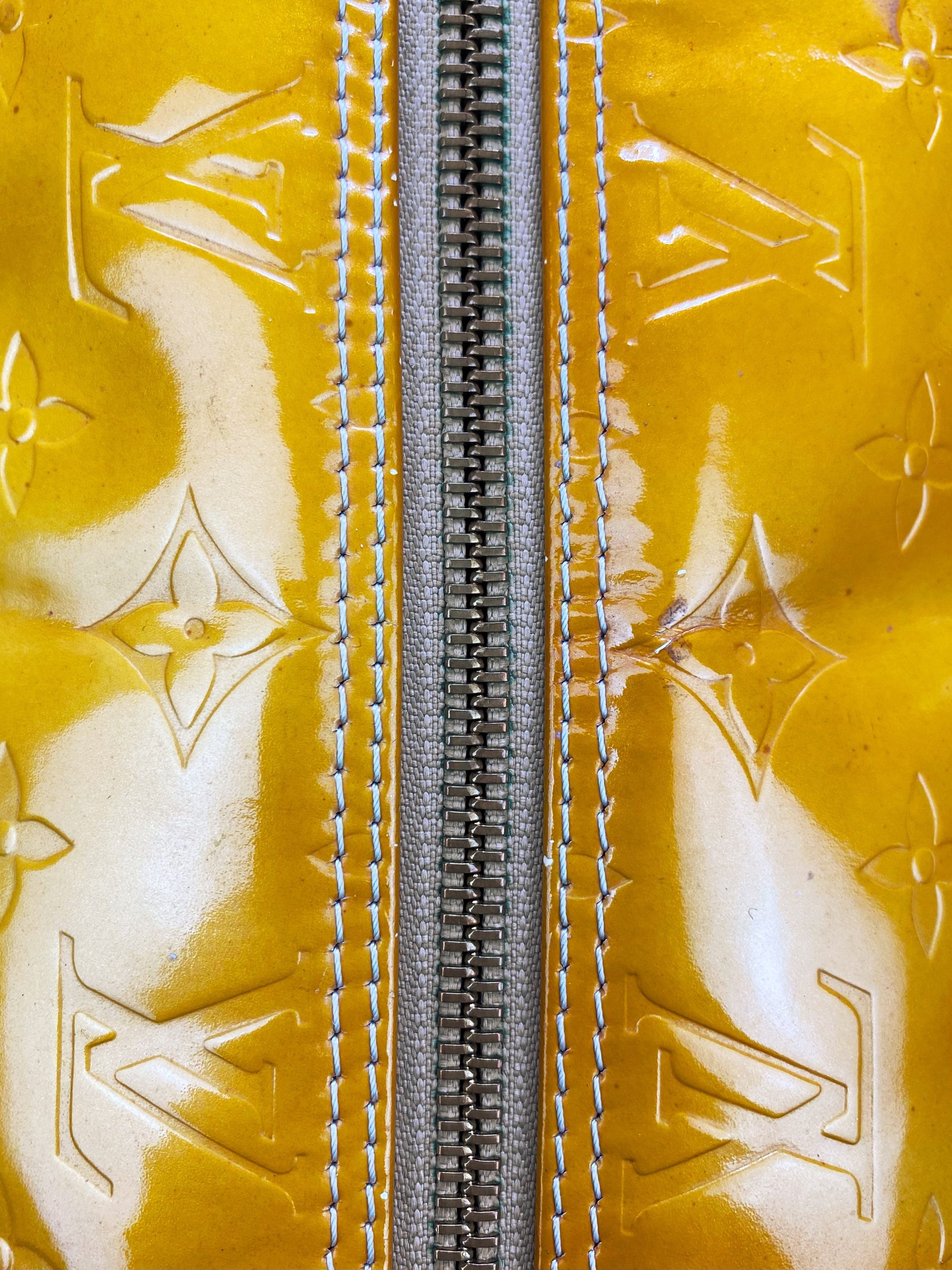 Louis Vuitton Embossed Yellow Leather Strap Roller Bag