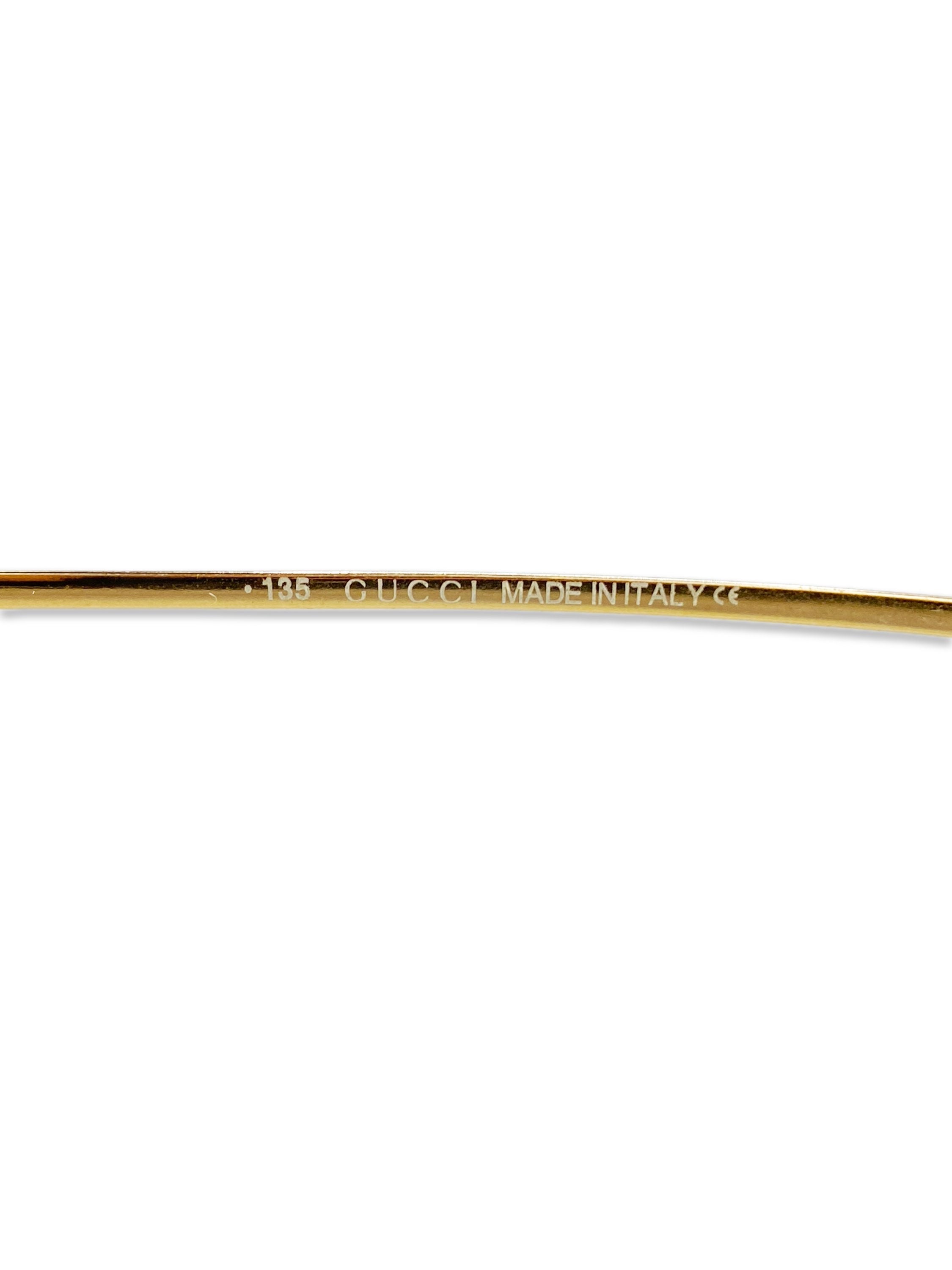 Gucci Warm Tint Gold Metallic Rounded Skinny Frame Sunglasses
