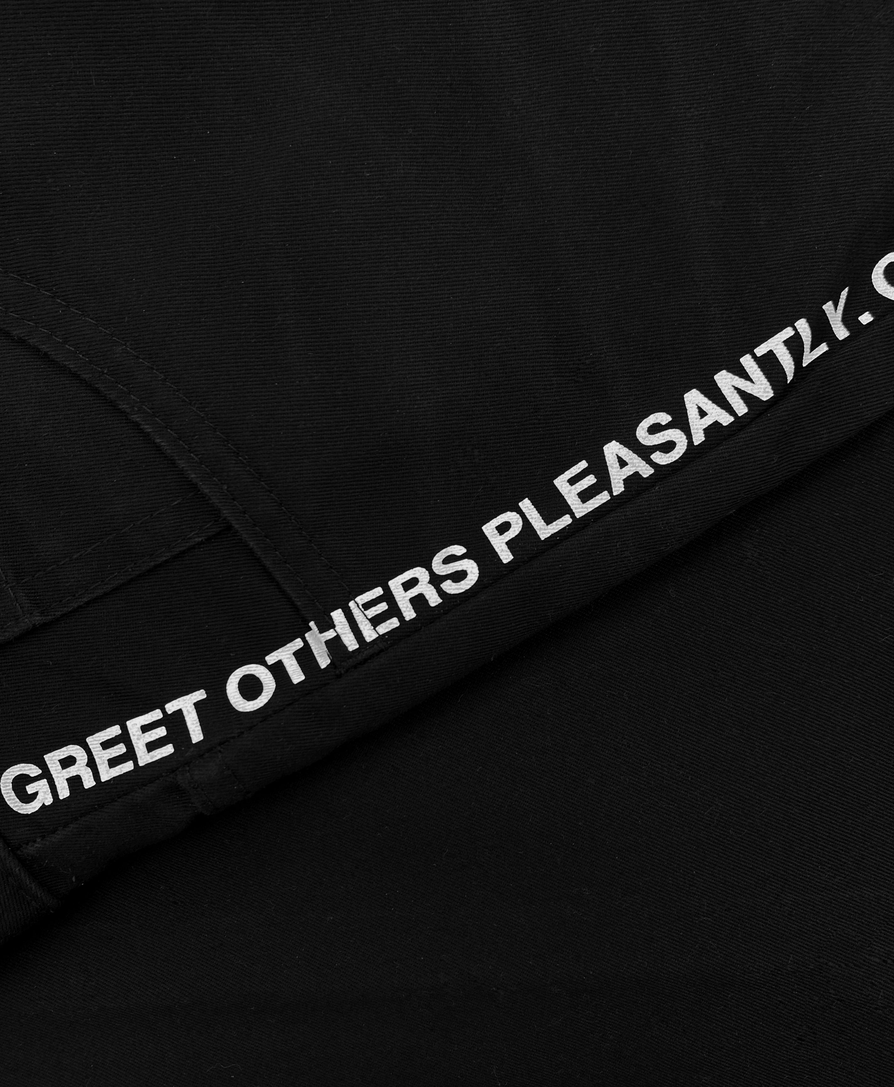 SS02 Junya Watanabe “Greet Others Pleasantly” Poem Trousers