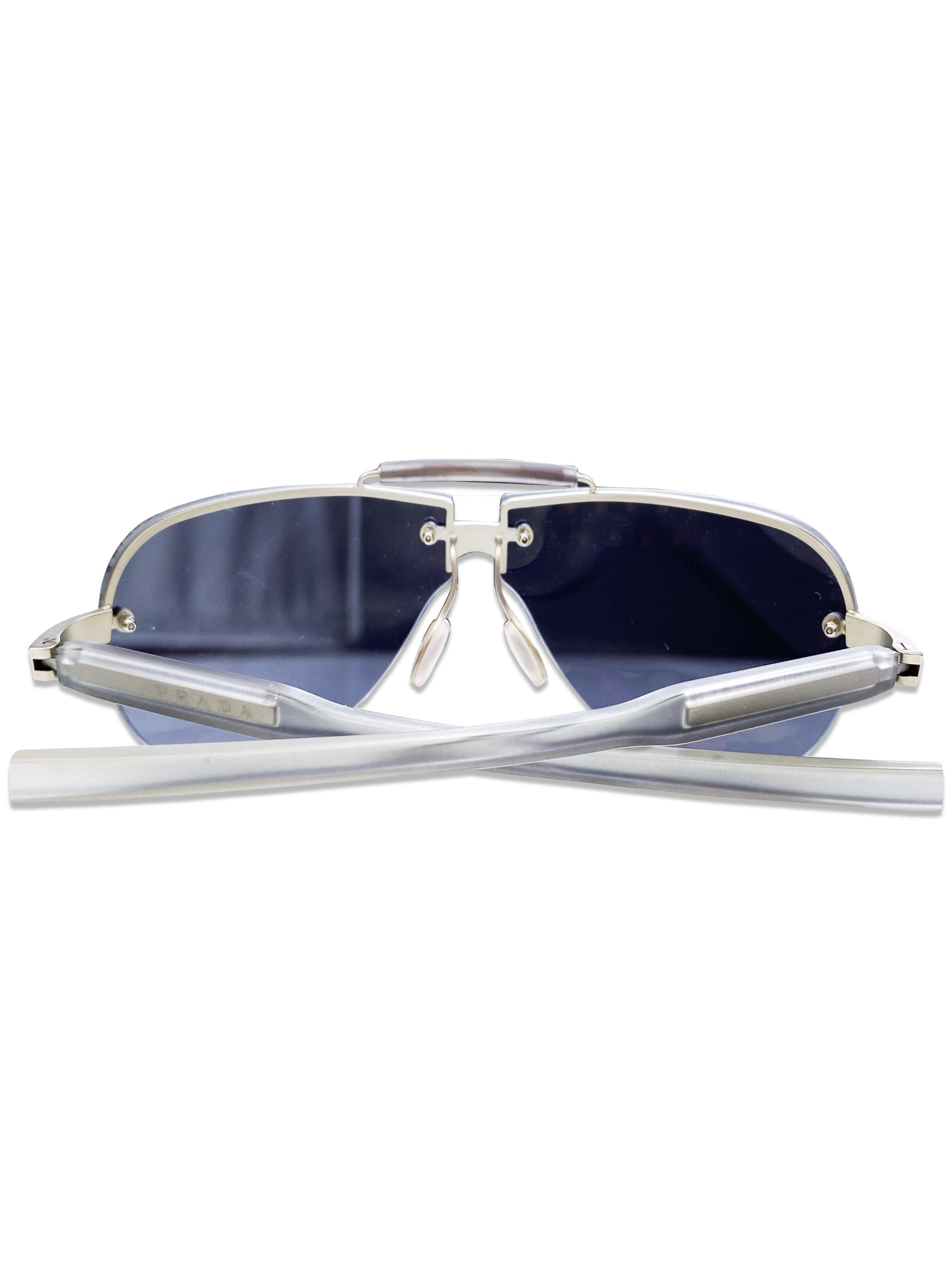 Prada Blue Tint Rounded Metallic Logo Etched Sunglasses