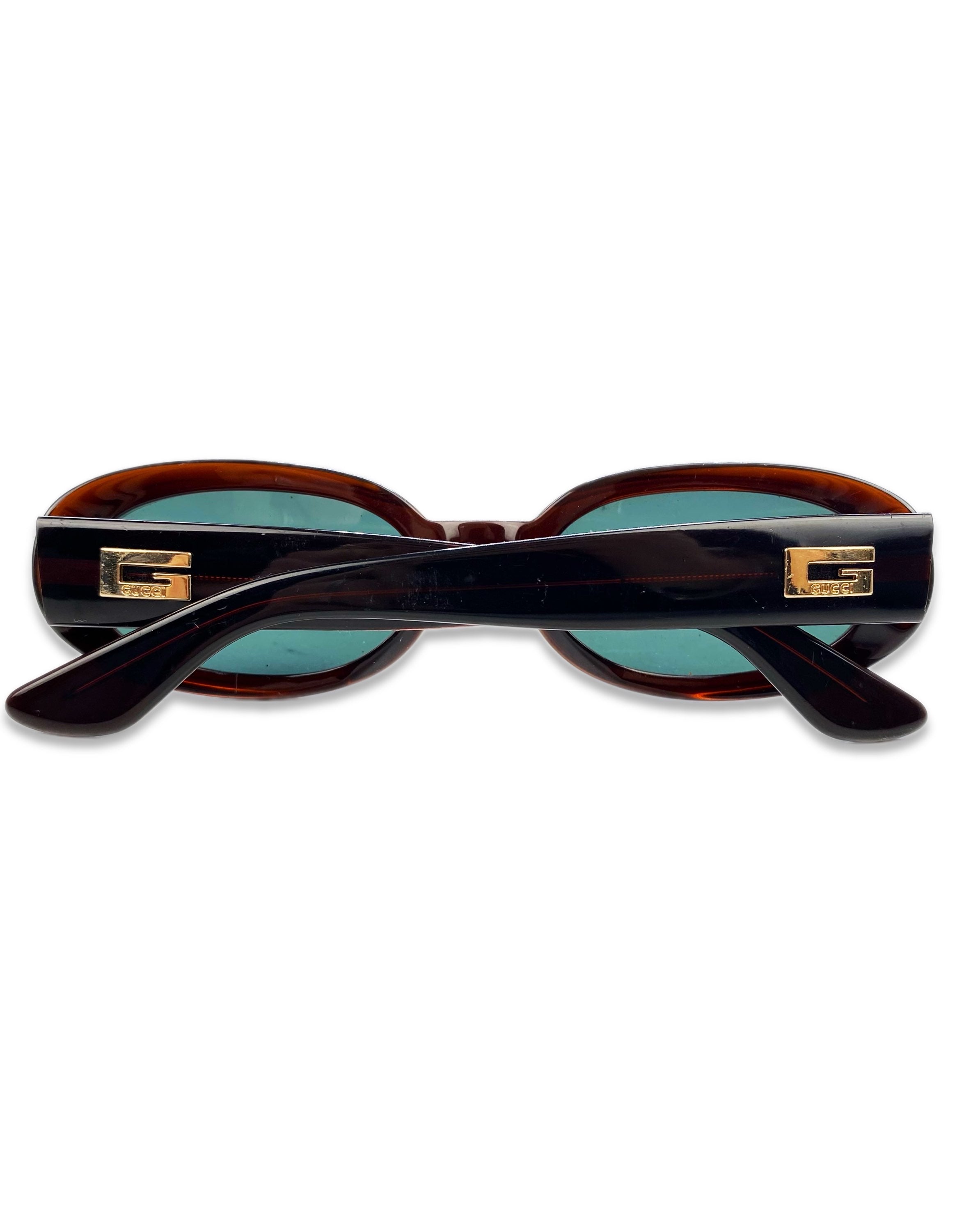 Gucci Blue Tint Oval Frame Metallic Sunglasses