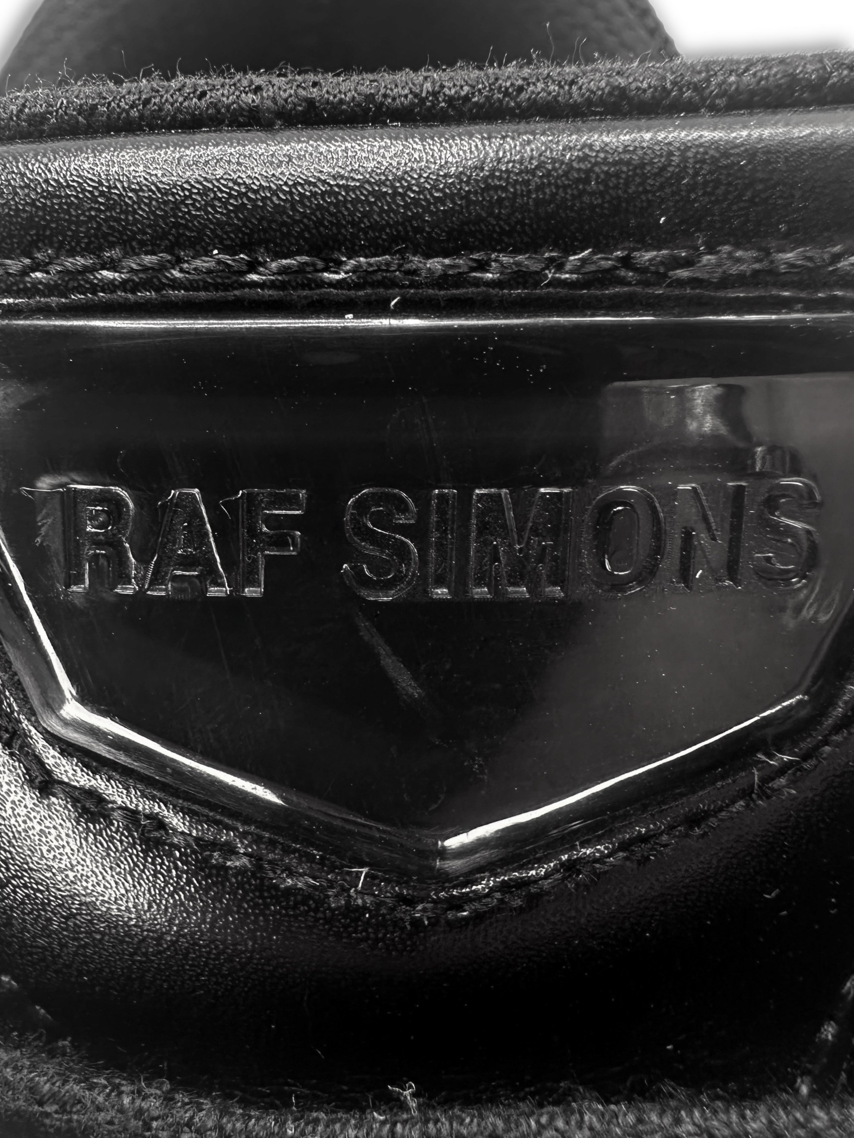 Raf Simons ‘Pharaphxus’ Black Low-top Leather Sneakers