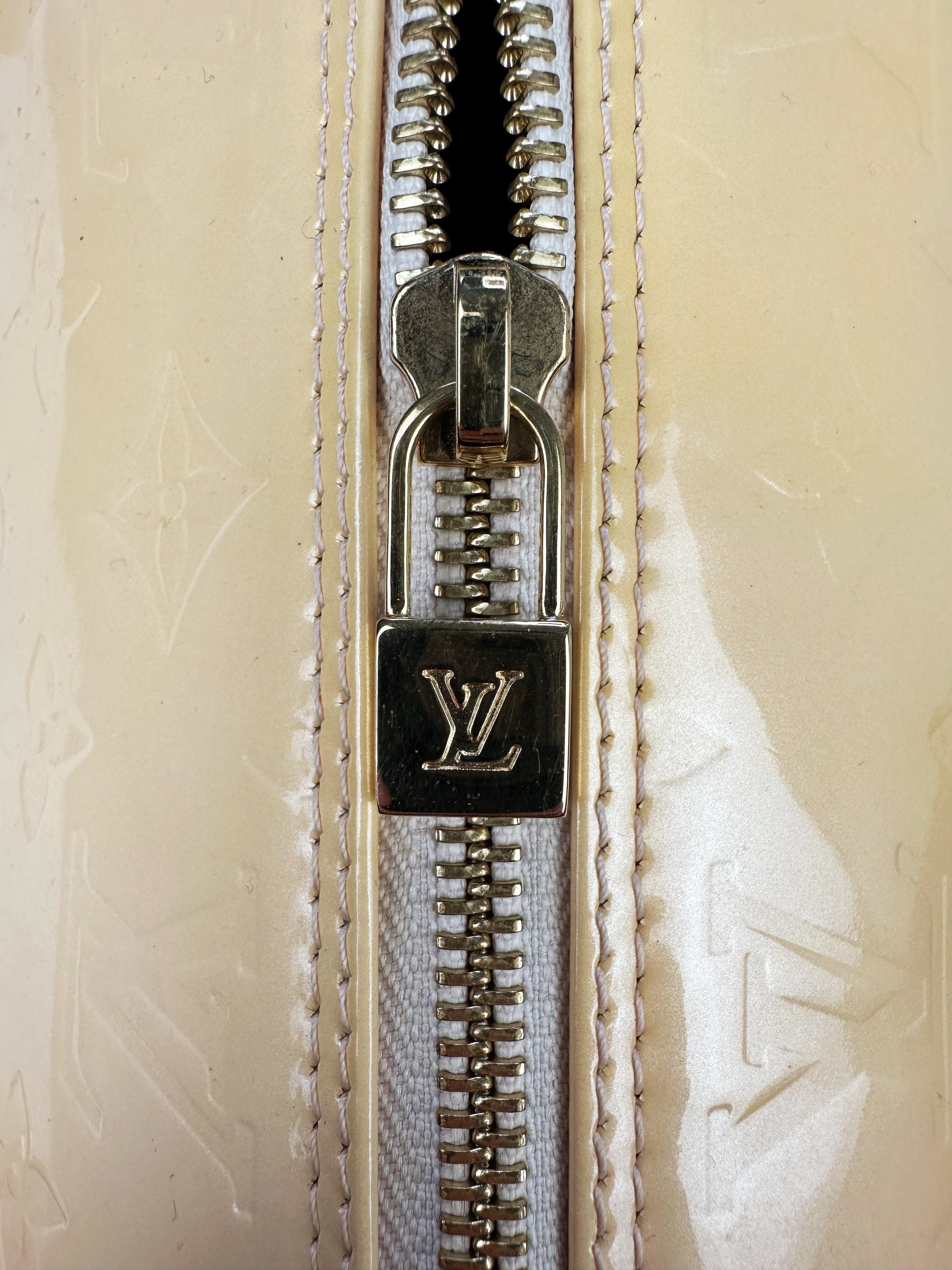 Louis Vuitton Embossed LV Monogram Tan Roller Bag