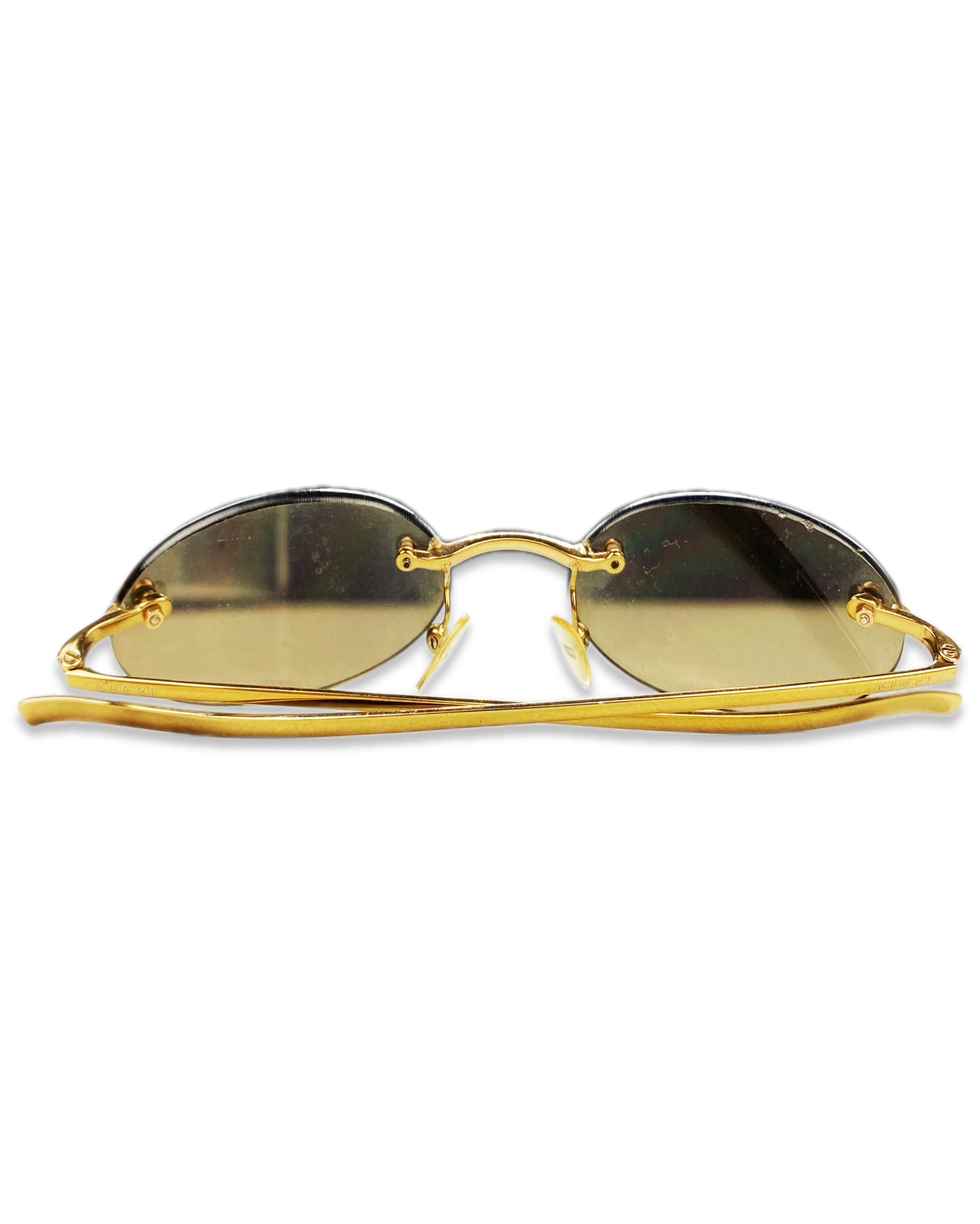 Gucci Warm Tint Gold Metallic Rounded Skinny Frame Sunglasses