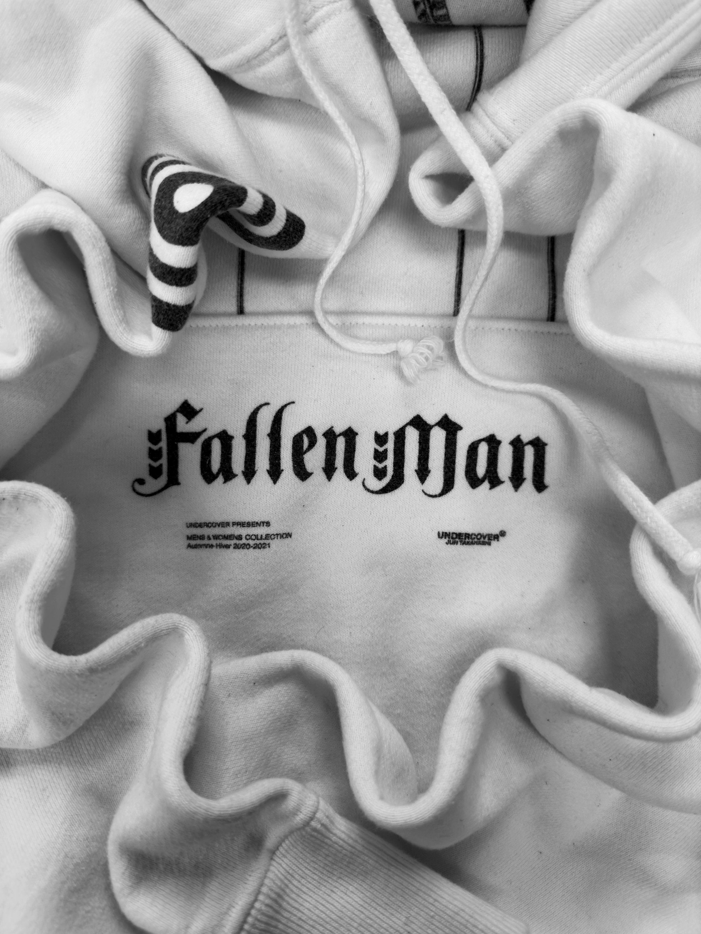 AW20 Undercover ‘Fallen Man’ Arrow Graphic White Hoodie