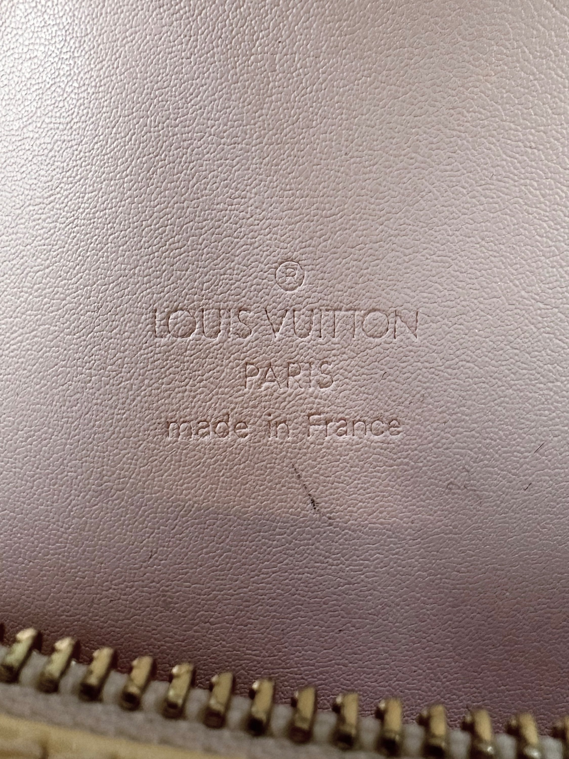 Louis Vuitton Embossed LV Monogram Tan Roller Bag
