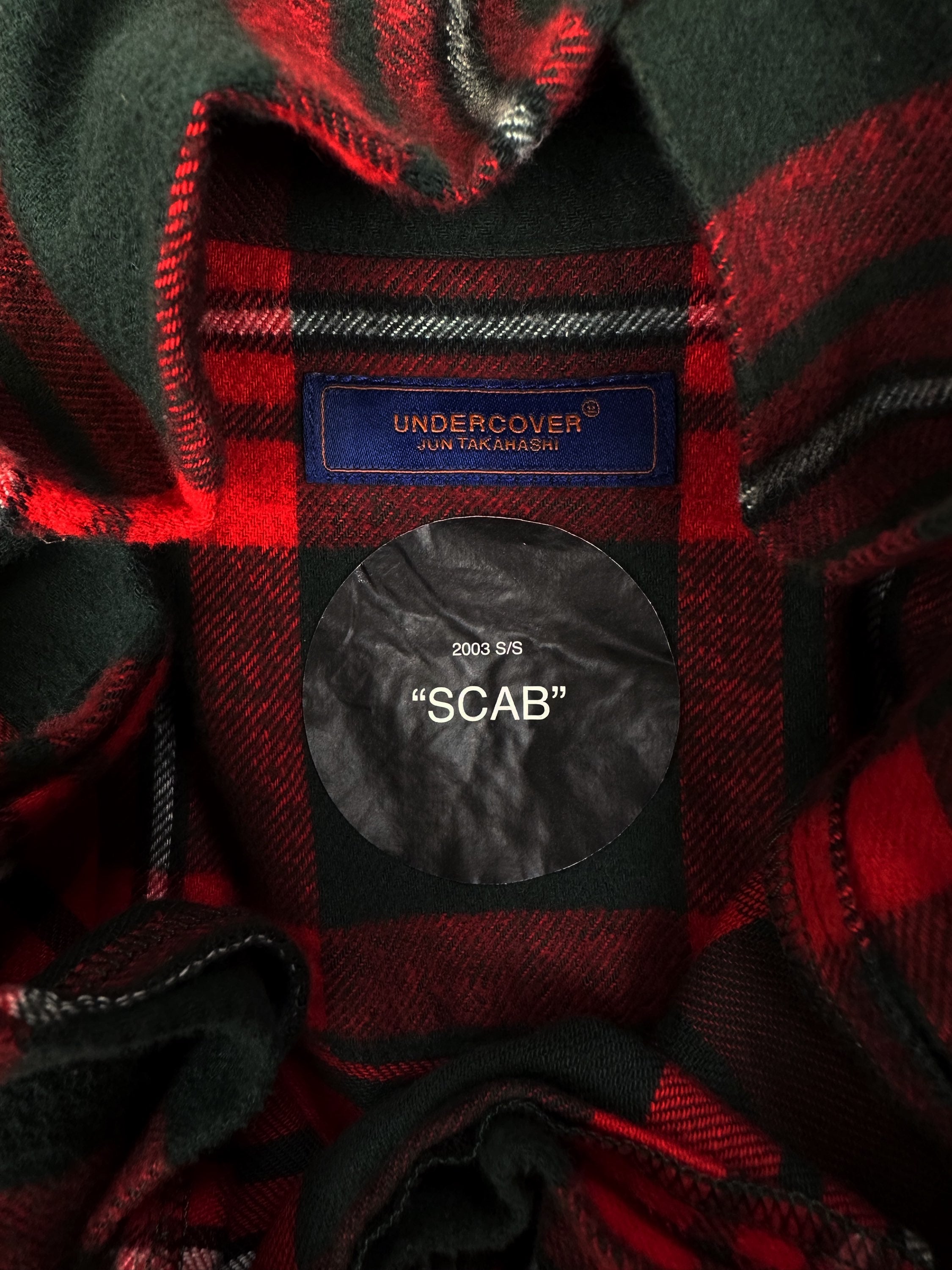 SS03 Undercover Scab ‘Step Inside’ Red Checkered Slogan Flannel Shirt