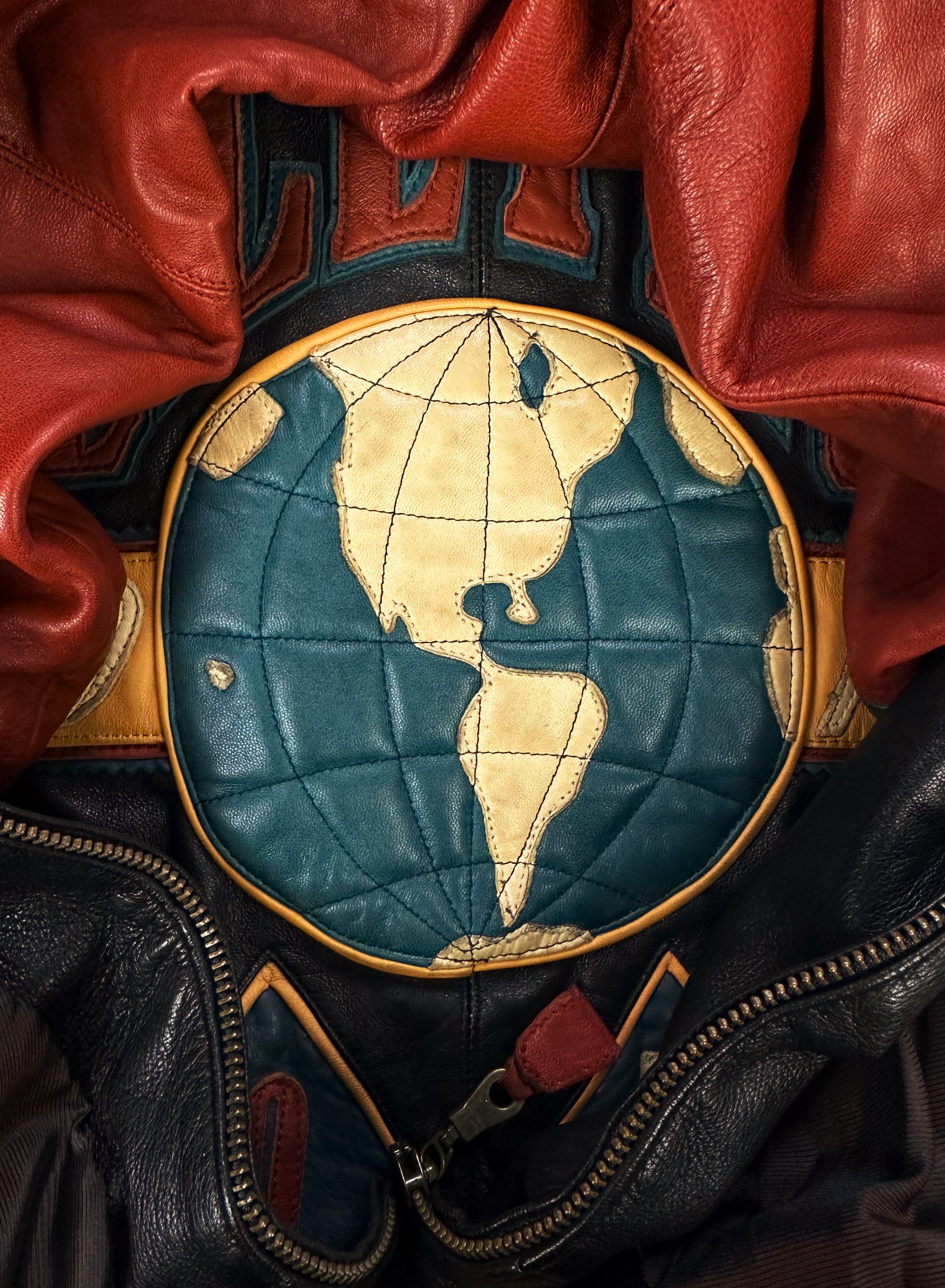 90s Pelle Pelle ‘Soda Club’ Patched Globe Leather Jacket