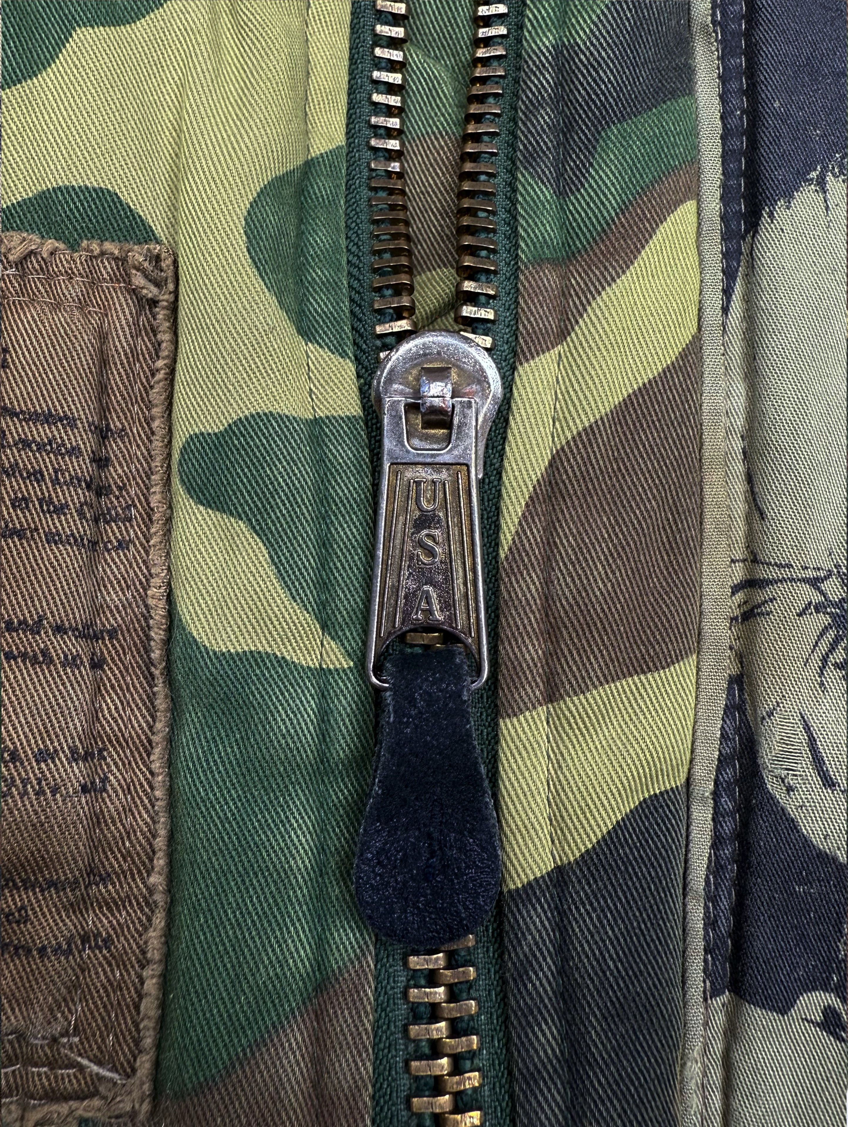 AW01 Raf Simons ‘Riot Riot Riot’ Camouflage Patched Bomber Jacket