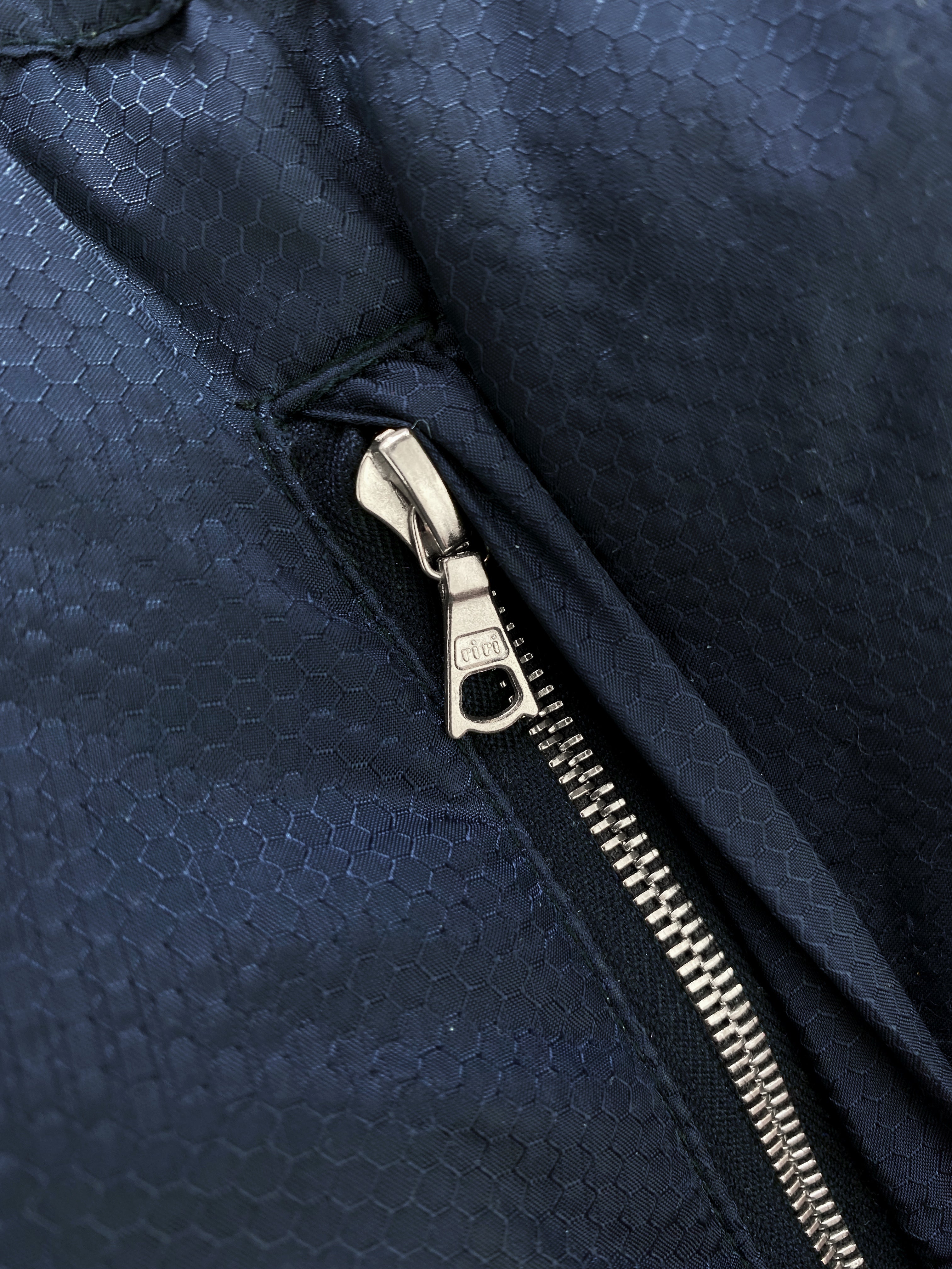 AW01 Undercover “Melting Pot” Small Parts Geometric Puffer Jacket