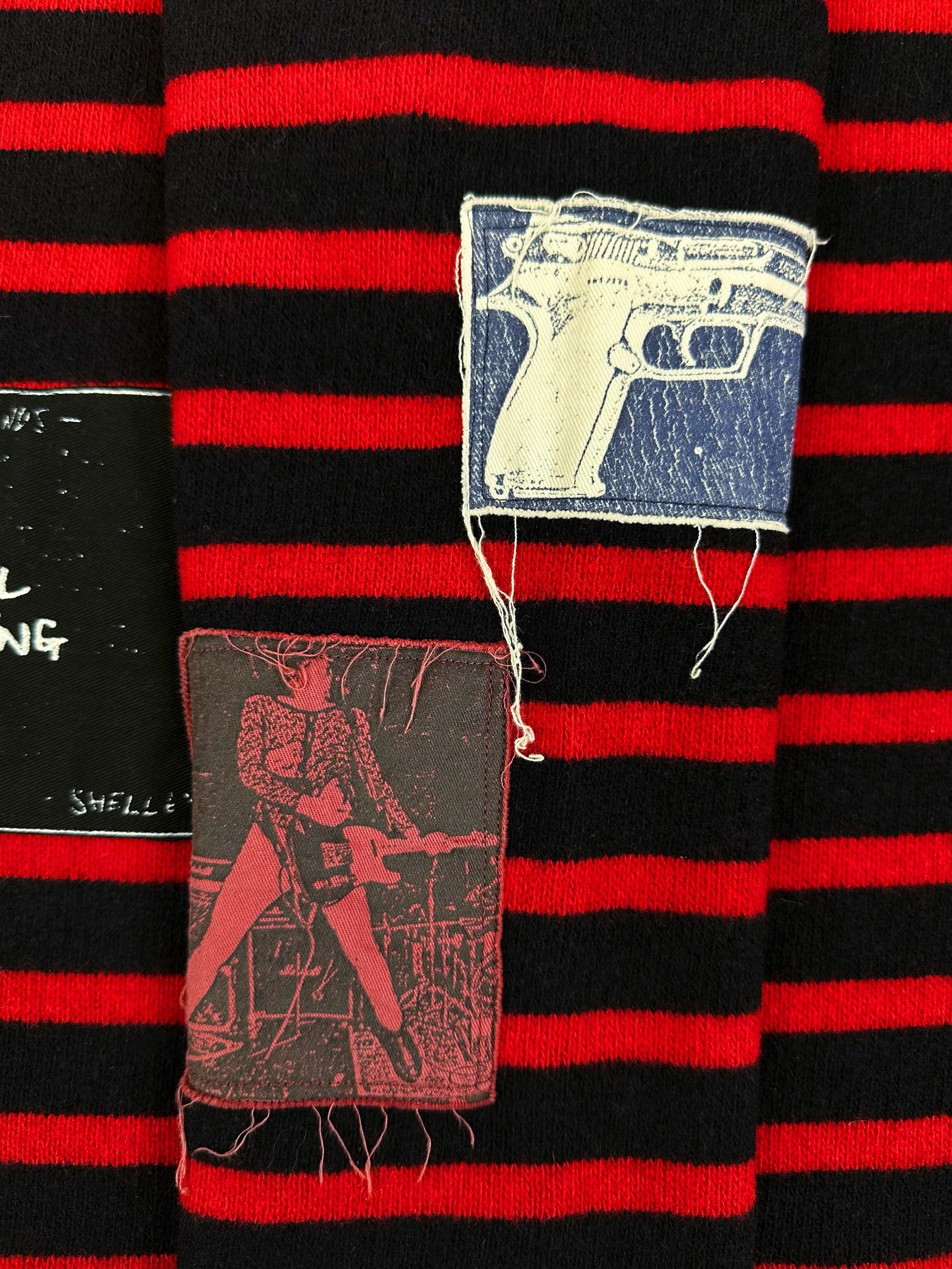 AW01 Raf Simons ‘Riot, Riot, Riot’ Patch Striped Turtleneck Sweater