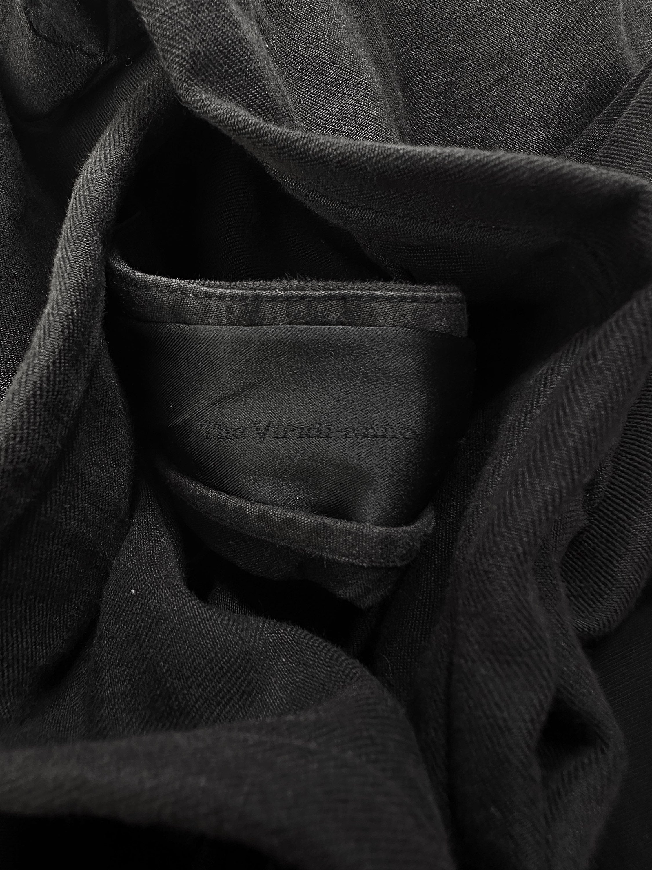 The Viridi Anne Black Stow Pocket Metal Clasp Pants