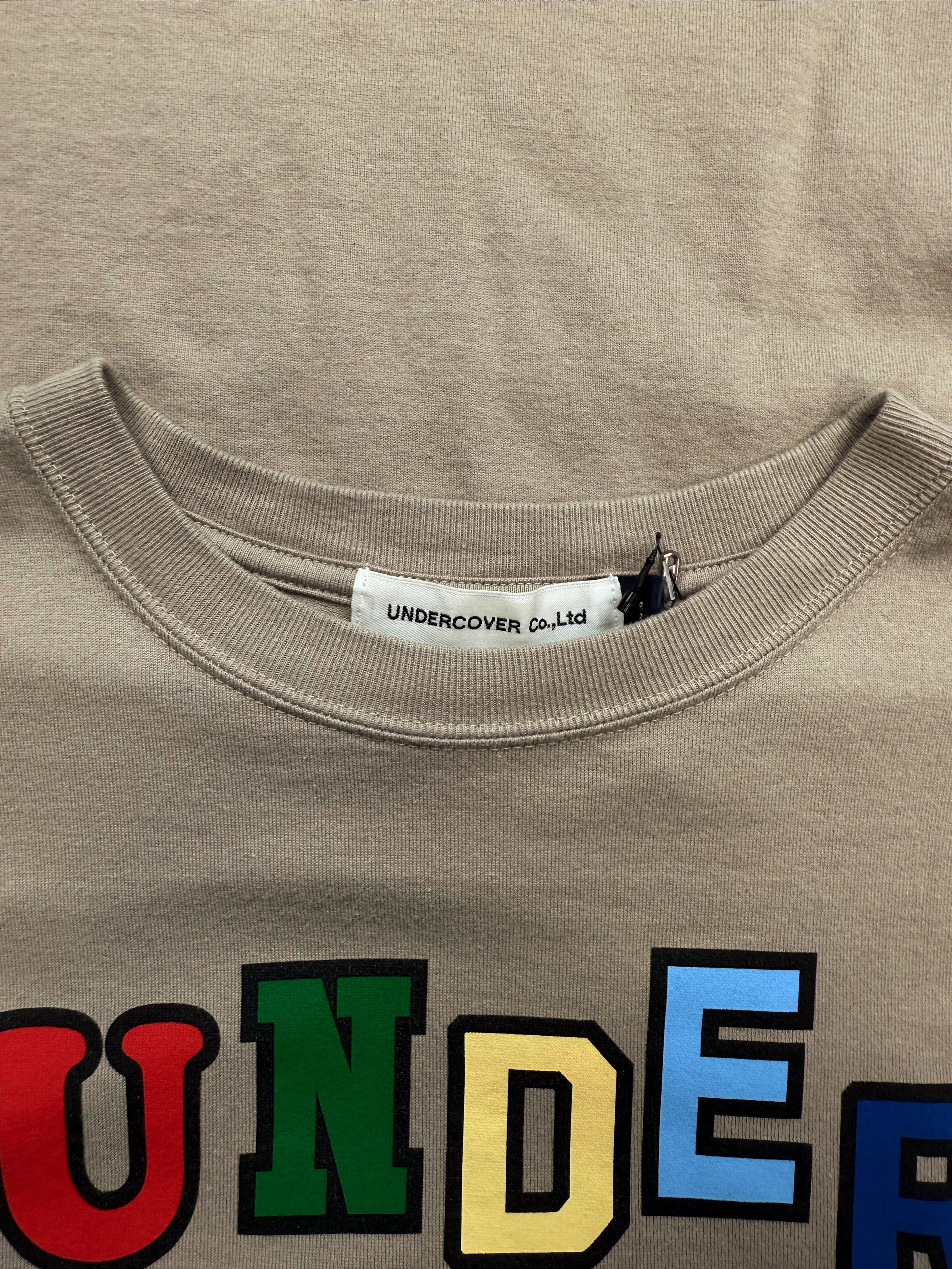 Undercover ‘Rose’ Graphic Beige Spell Out T-Shirt