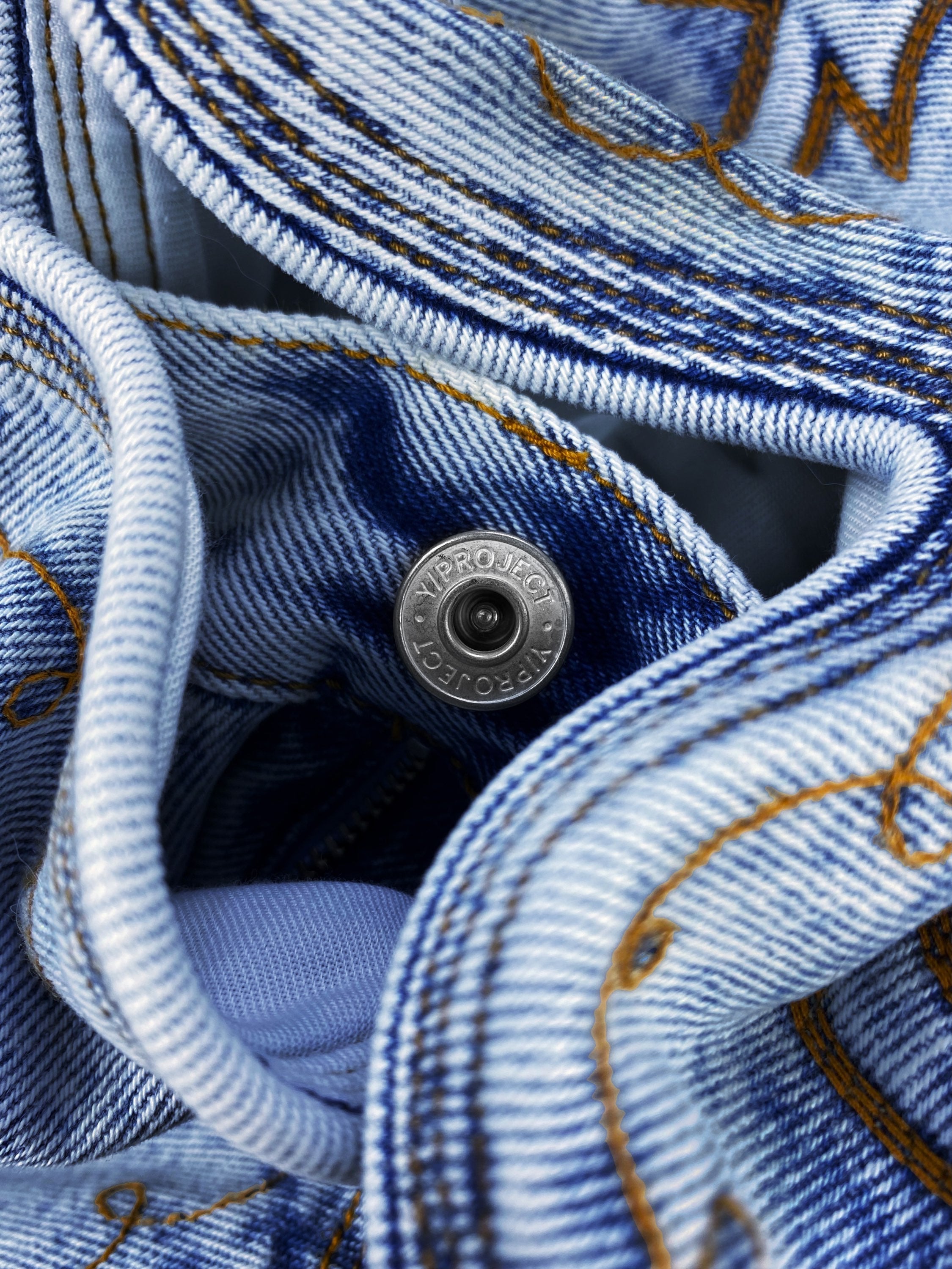 AW21 Y/Project Cowboy Cuff Acid Wash Bootcut Denim Jeans