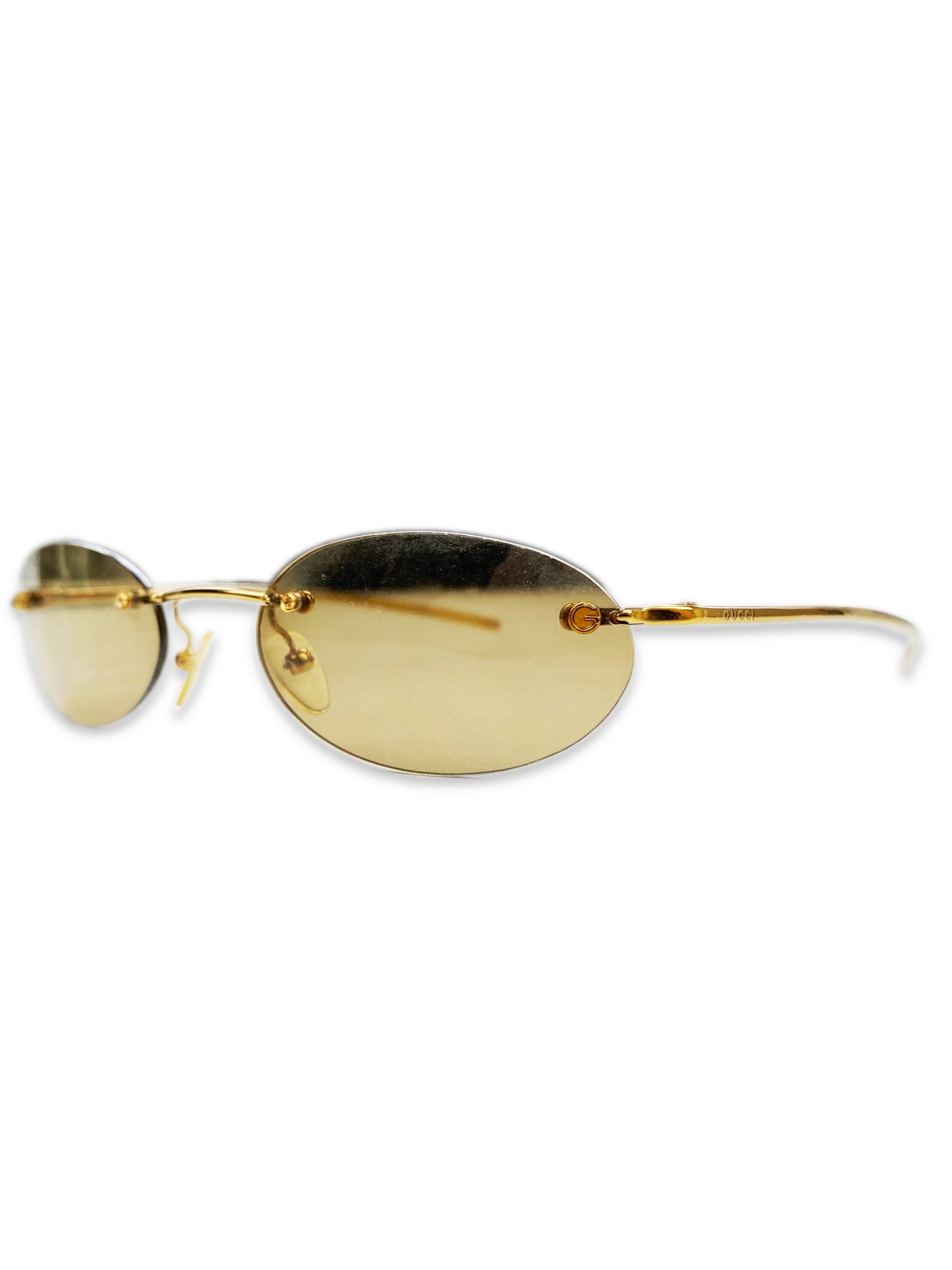Gucci Warm Tint Gold Metallic Rounded Skinny Frame Sunglasses