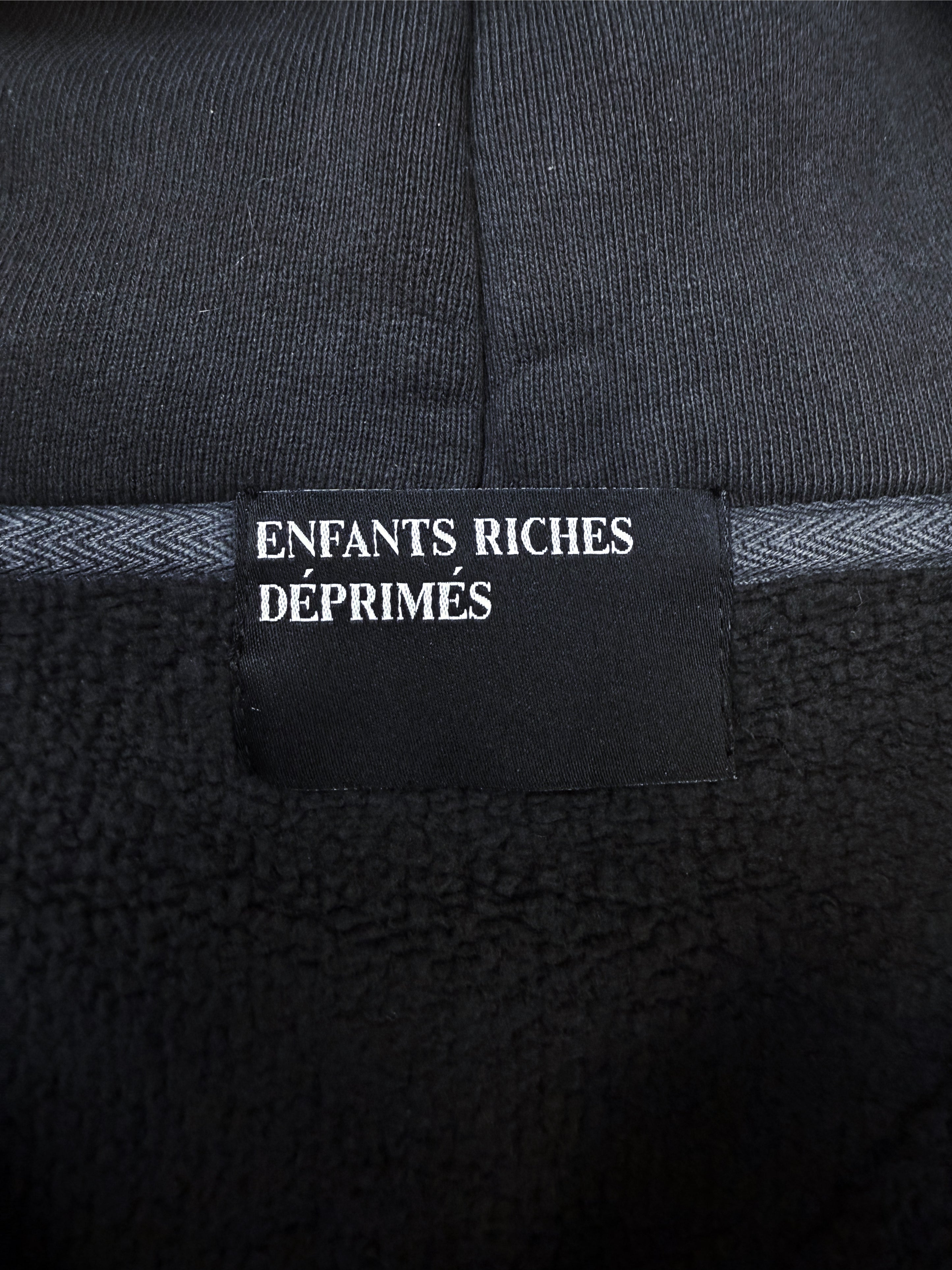 SS25 Enfants Riches Deprimes ‘Holy Bible’ Assemblage Zip-up Hoodie