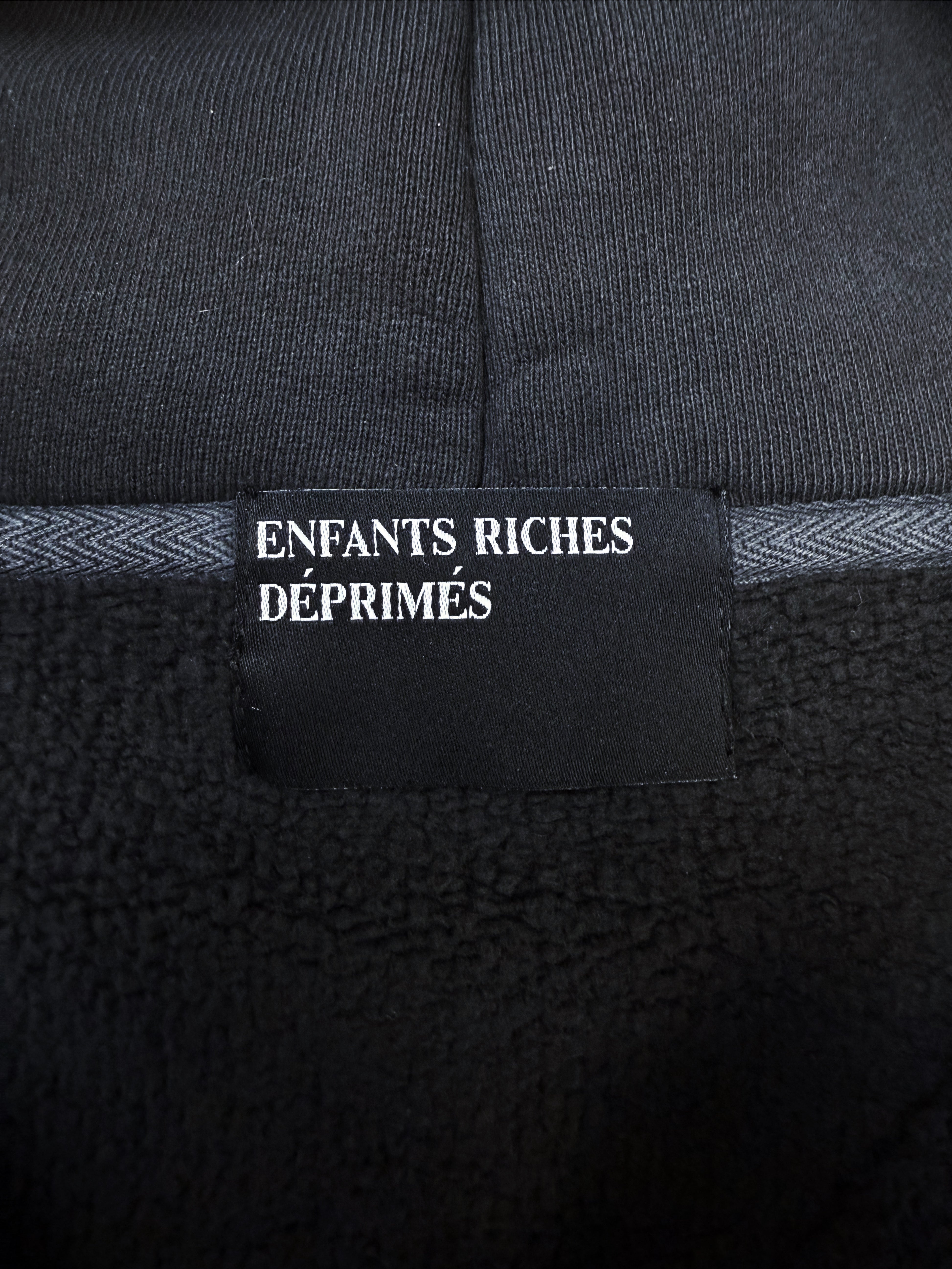 SS25 Enfants Riches Deprimes ‘Holy Bible’ Assemblage Zip-up Hoodie