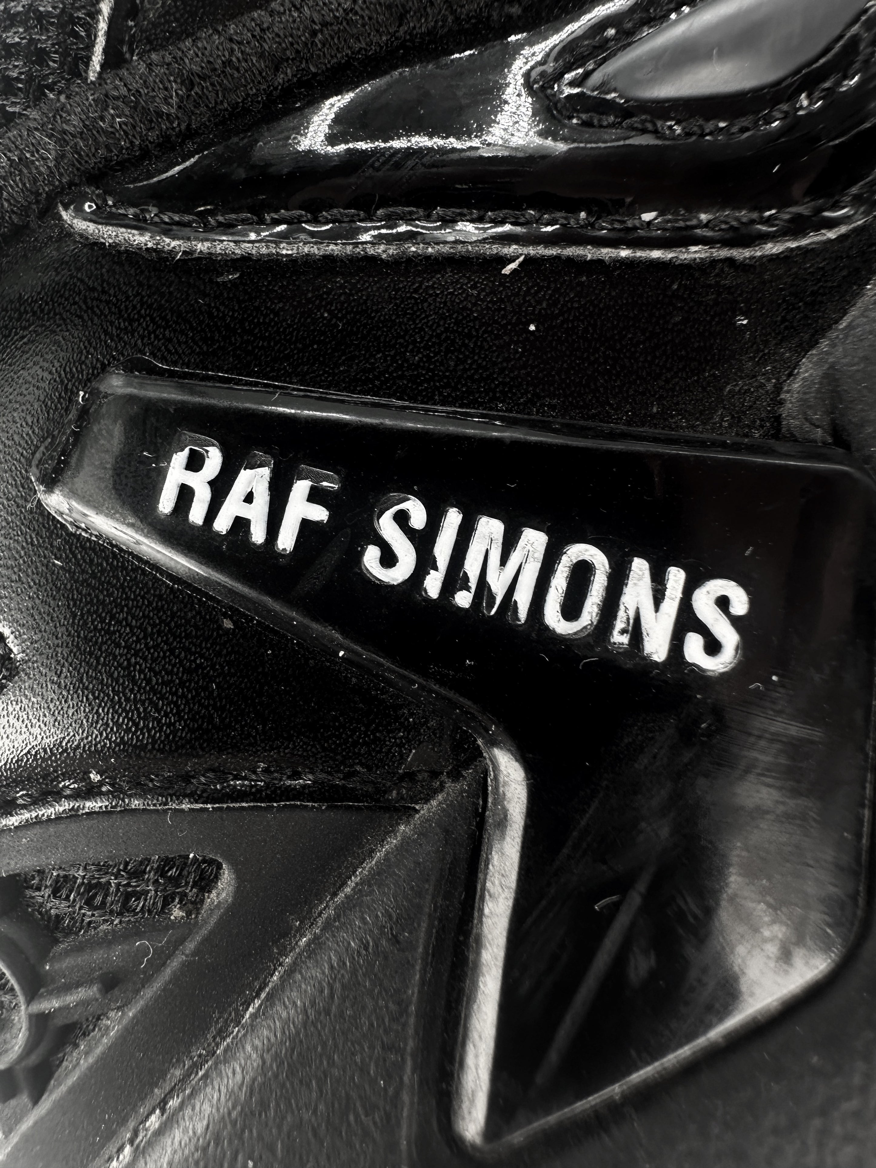 Raf Simons ‘Pharaphxus’ Black Low-top Leather Sneakers