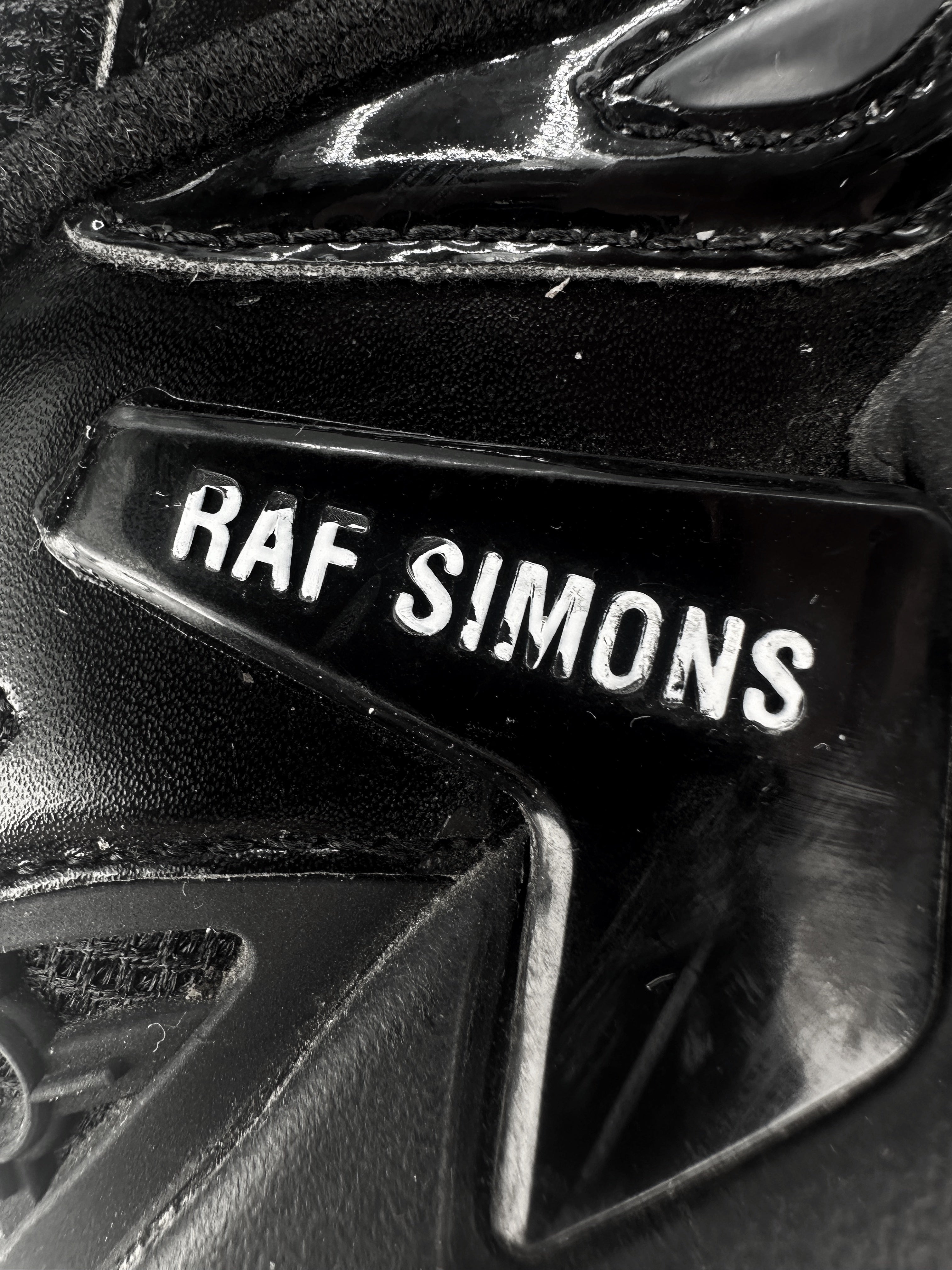 Raf Simons ‘Pharaphxus’ Black Low-top Leather Sneakers