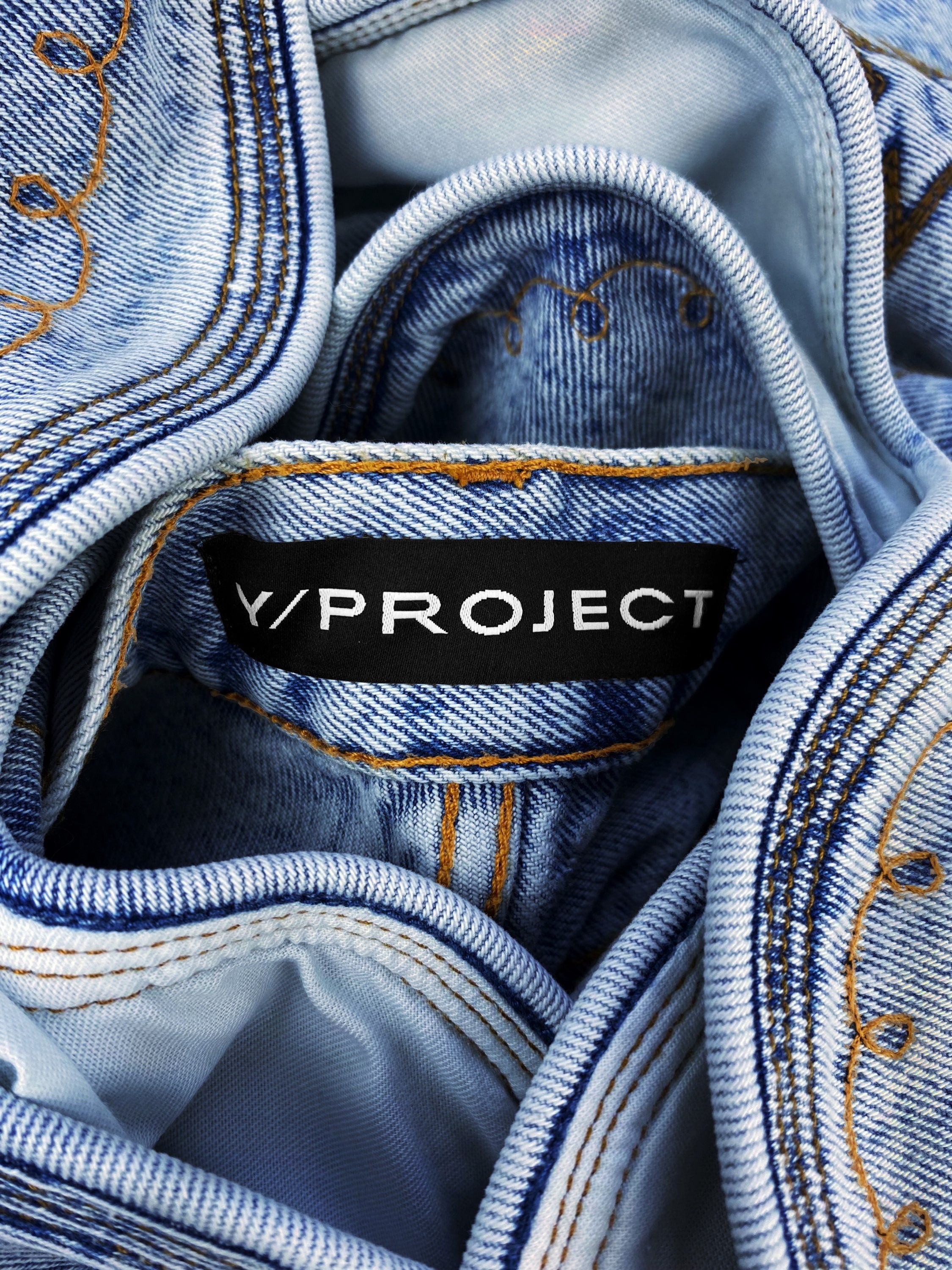 AW21 Y/Project Cowboy Cuff Acid Wash Bootcut Denim Jeans