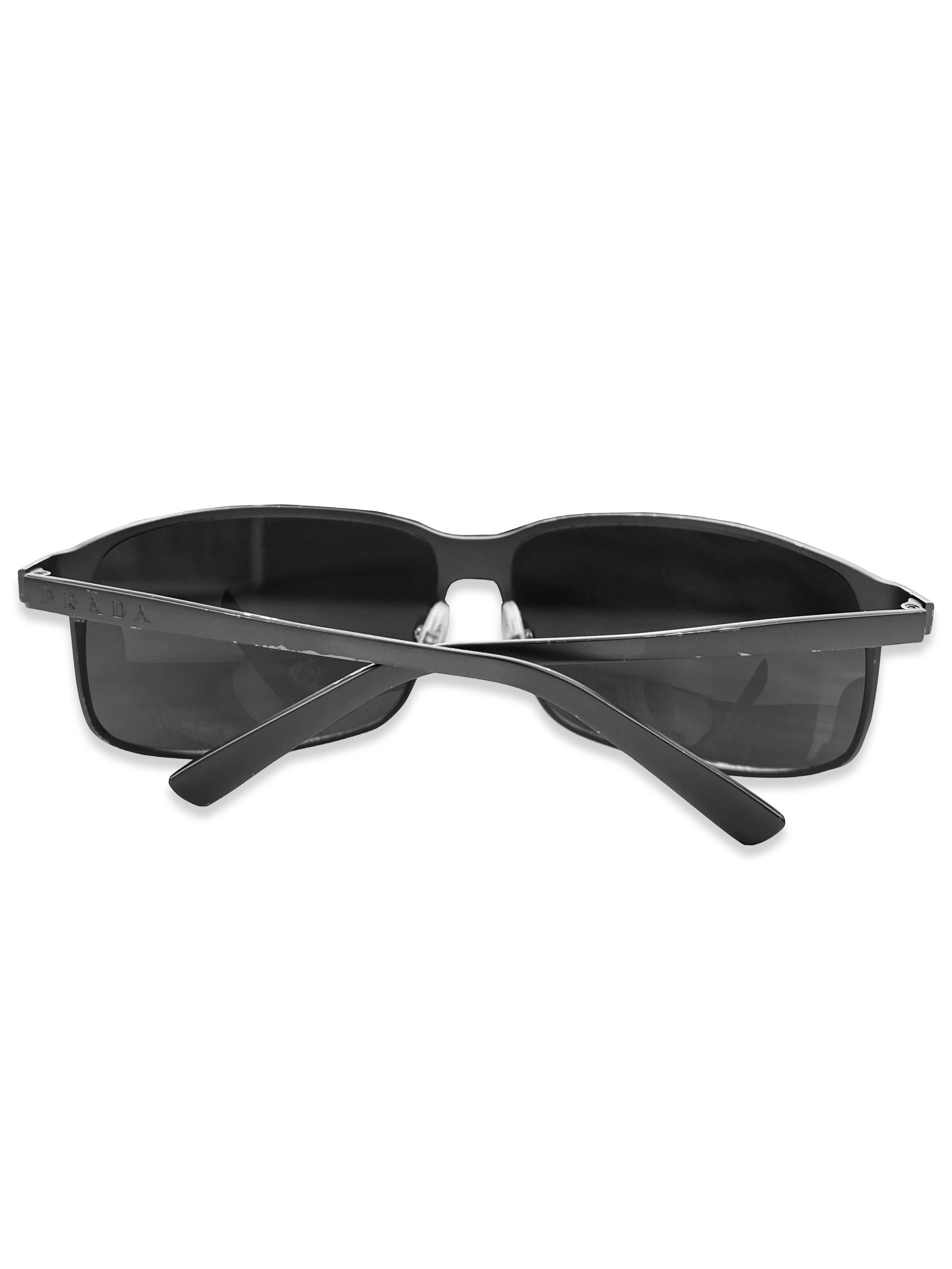 Prada Titanium Gun Metal Dark Tint Engraved Sunglasses