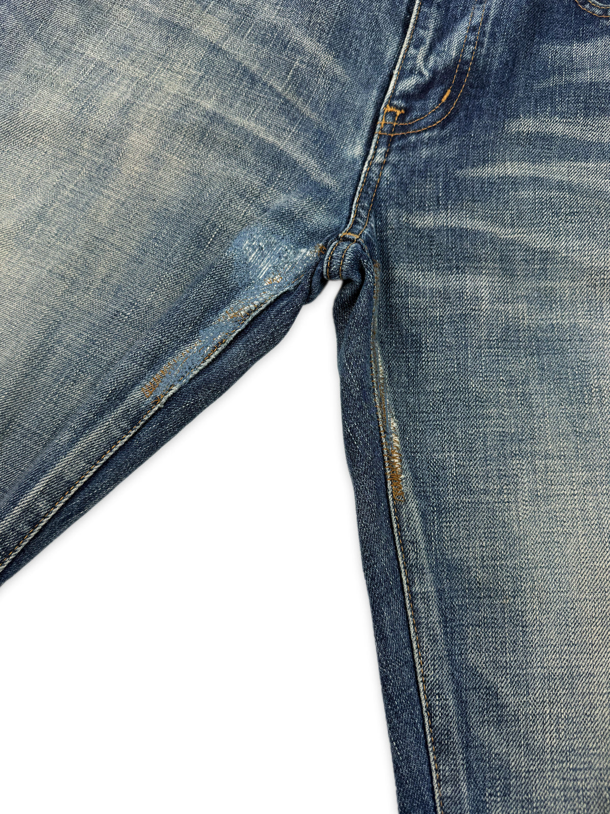 Saint Laurent Paris D02 Distressed Light Wash Skinny Jeans
